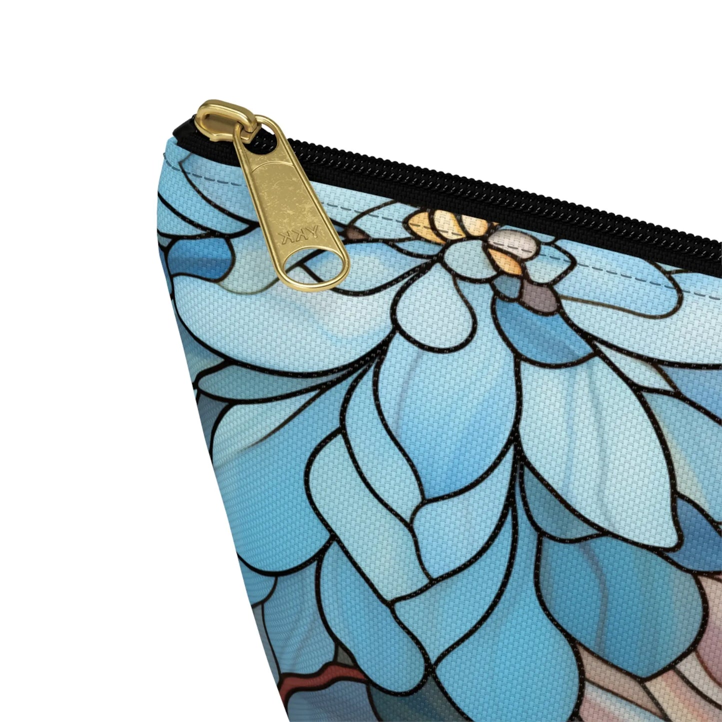 The Stained Glass Dark Flowers Cosmetic Bag features a close-up of its zippered pouch with a floral stained glass design, ideal as a boho gift. The zipper is slightly open, showing a gold pull against textured fabric with blue petals and black outlines.