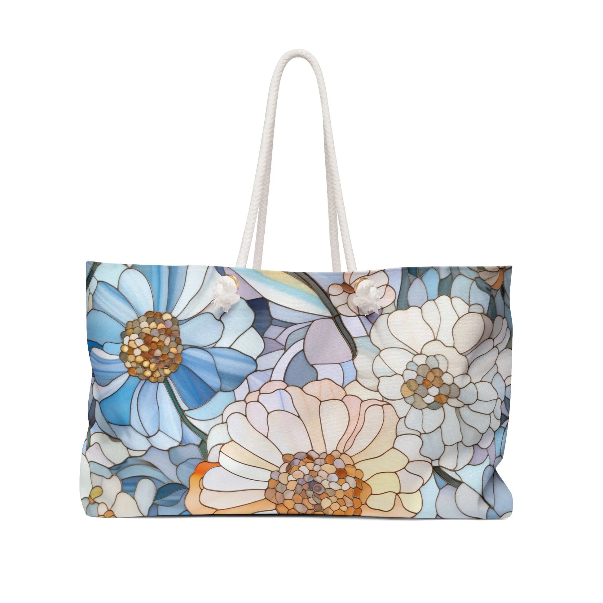The Stained Glass Flowers Oversized Tote Bag features a floral design with blue and white flowers on a light background and sturdy white rope handles, making it an ideal boho gift.