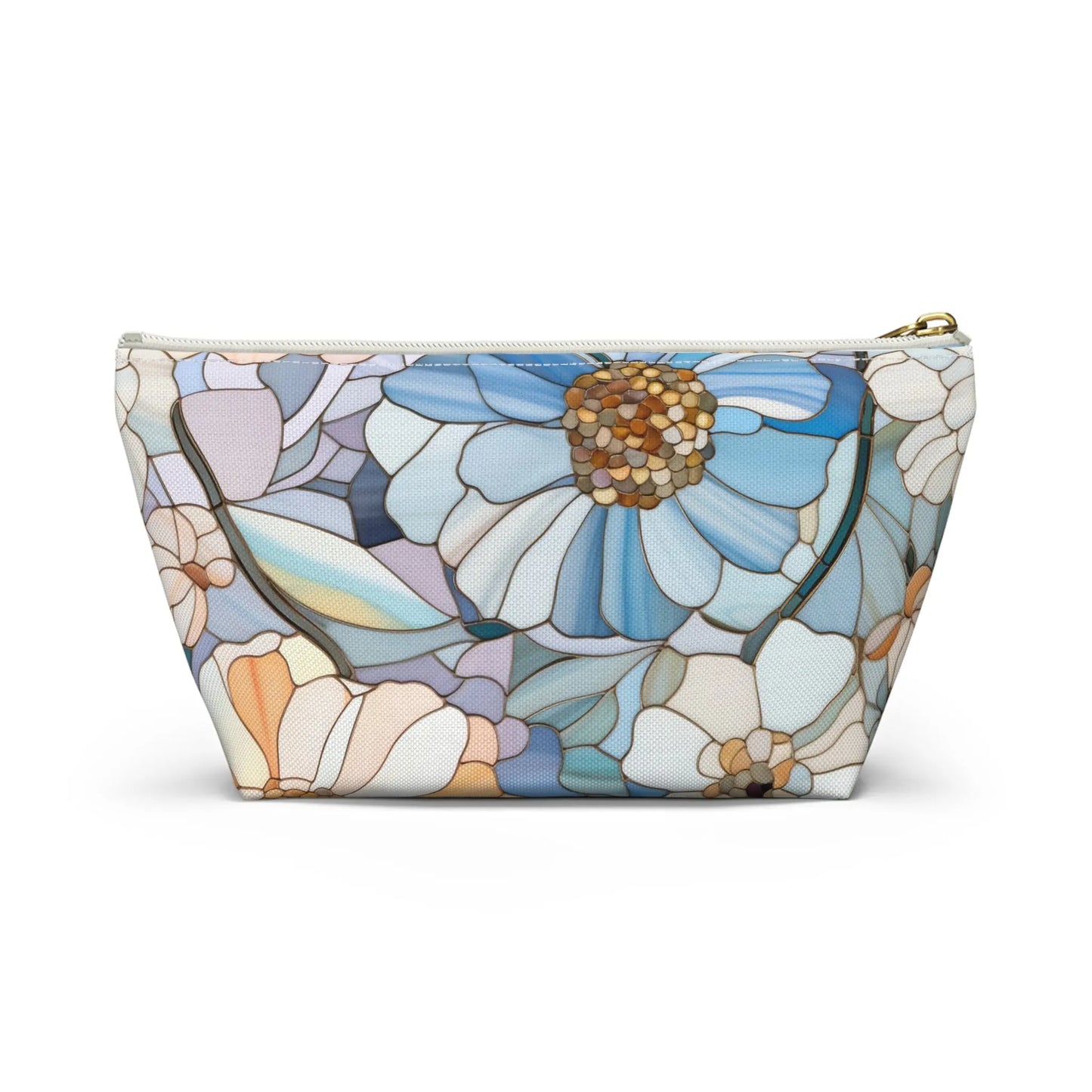 The Stained Glass Flowers Cosmetic Bag is a zippered pouch with a floral design featuring large blue and white flowers on a light background. This chic, flat-bottom cosmetic bag offers an elegant, boho gift option combining both style and practicality.