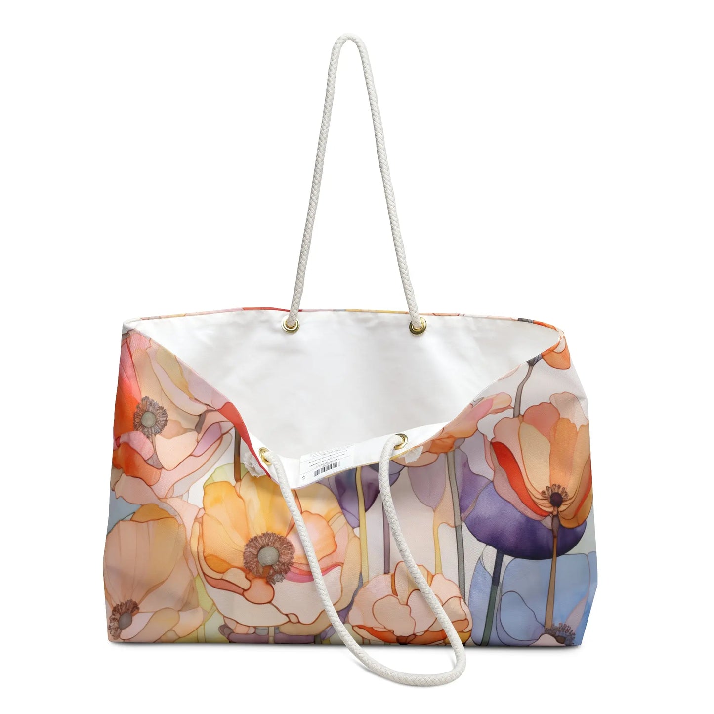 The Stained Glass Rainbow Poppies Oversized Tote Bag features a vibrant floral design with stained glass rainbow poppy flowers, long white rope handles threaded through metal grommets, and a crisp white interior lining.