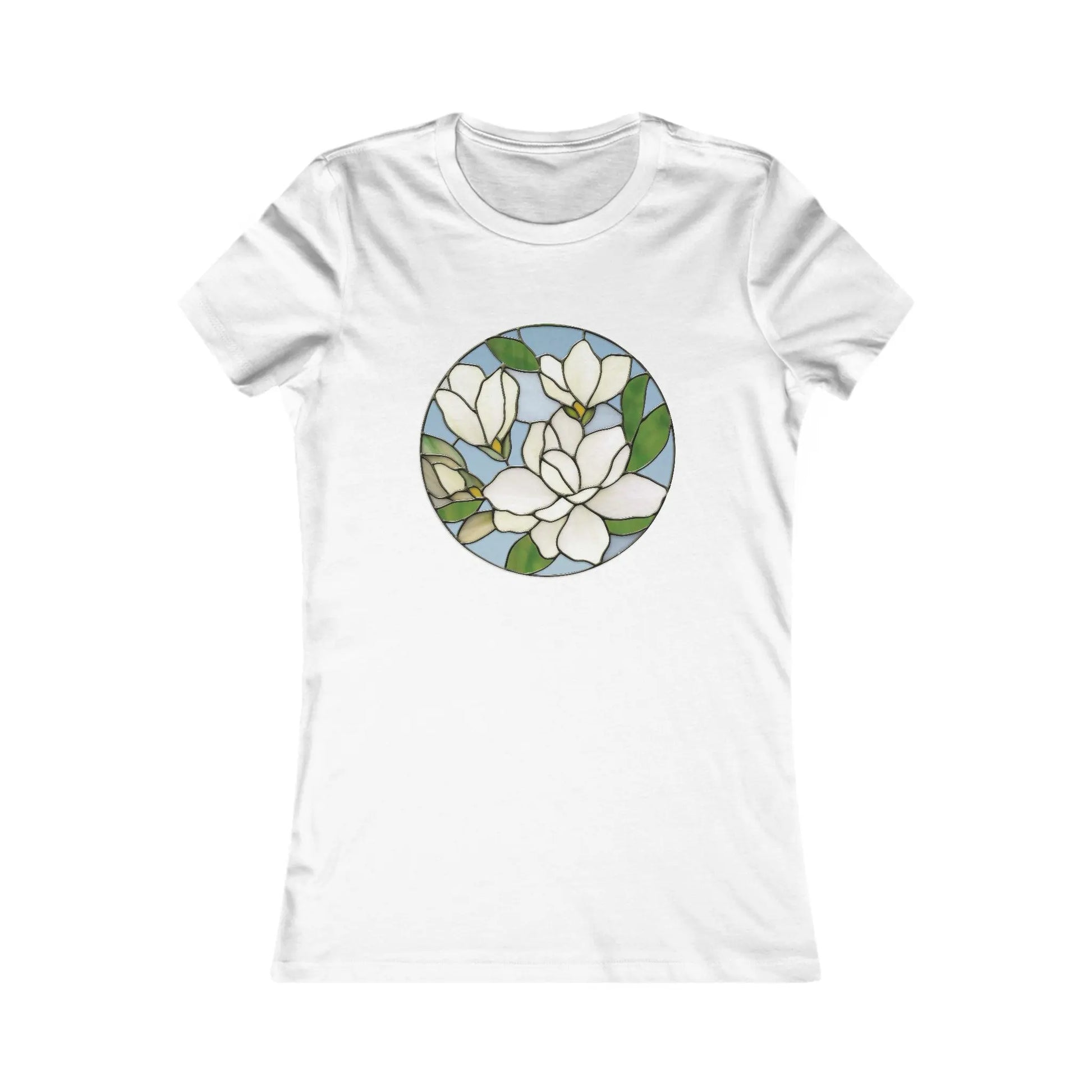 The Stained Glass Magnolia Womens Tee Shirt features a circular stained glass design with white flowers and green leaves on a light blue background, offering comfort and an artistic touch for those who value sustainable fashion.