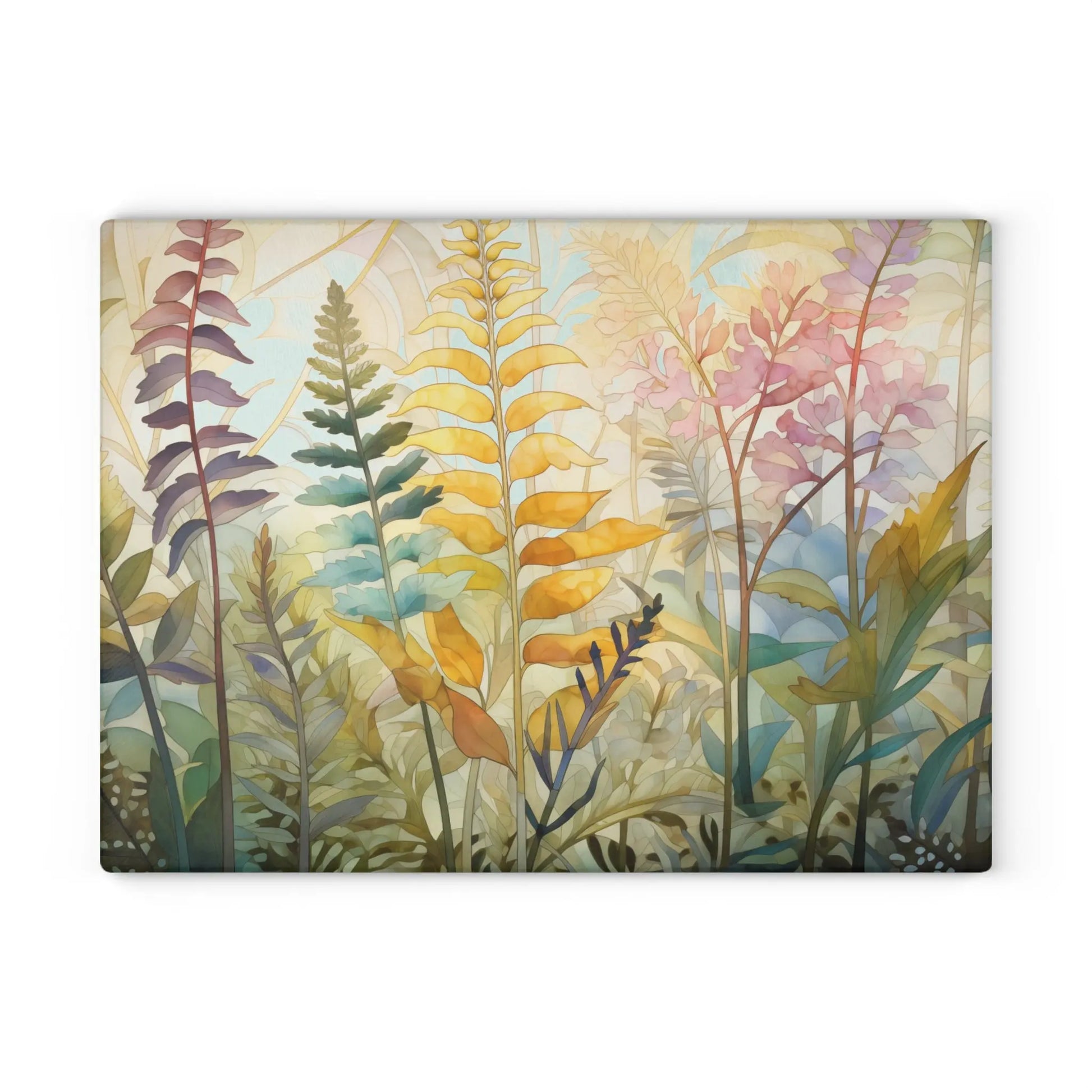 The Stained Glass Pastel Ferns Glass Cutting Board features tall, colorful plants and ferns with shades of green, gold, pink, and blue in a watercolor effect. The design evokes a stained glass ambiance on a light background, creating a dreamy and serene atmosphere.