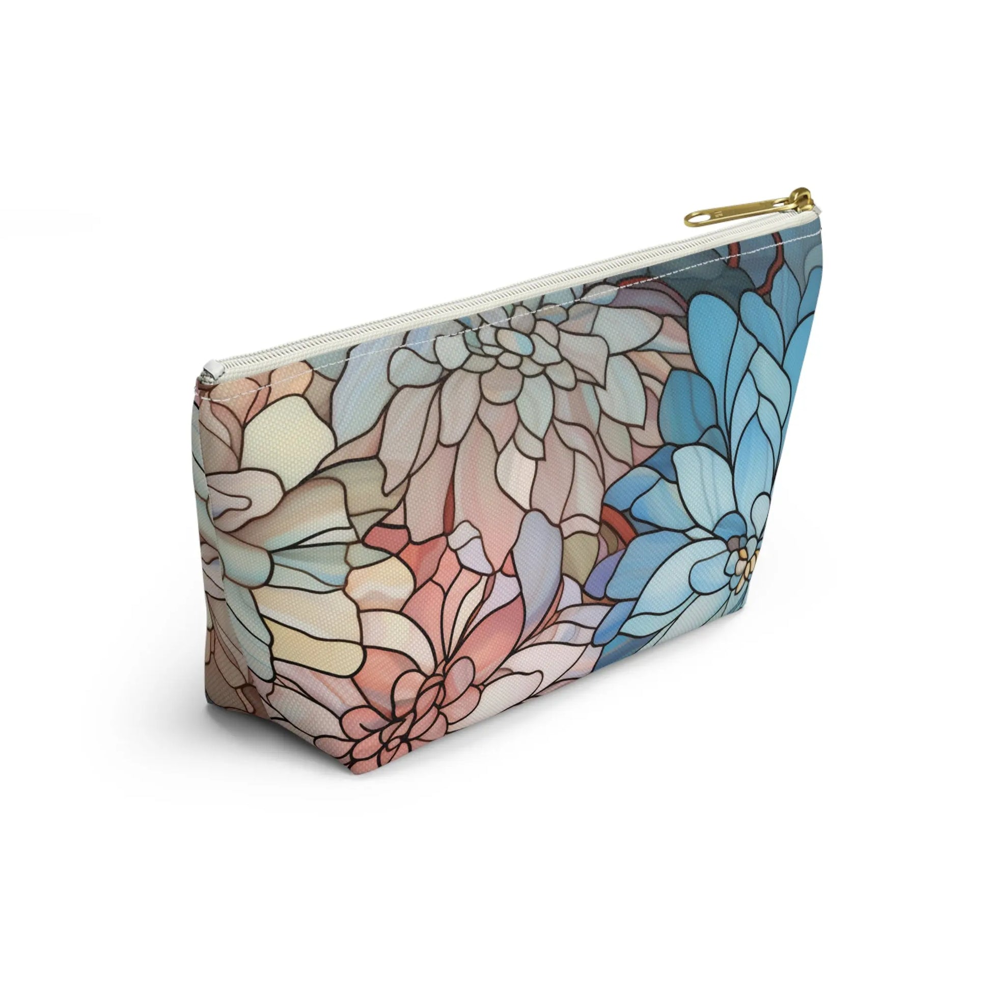 The Stained Glass Dark Flowers Cosmetic Bag is a zippered pouch with large floral patterns in pastel blue, pink, and beige on white. Perfect for a boho gift, it features a stylish design and gold zipper.