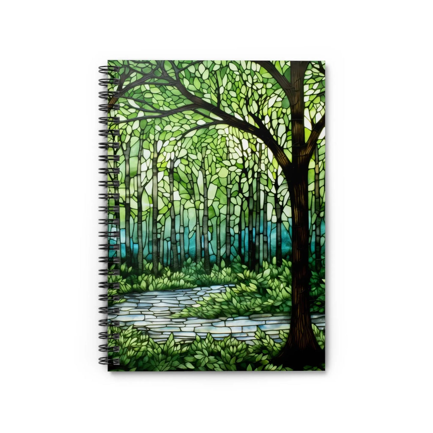 The Stained Glass Forest Spiral Notebook features a spiral-bound design with a vibrant stained glass-style cover showcasing lush trees, greenery, and a winding stone path in rich shades of green and brown.