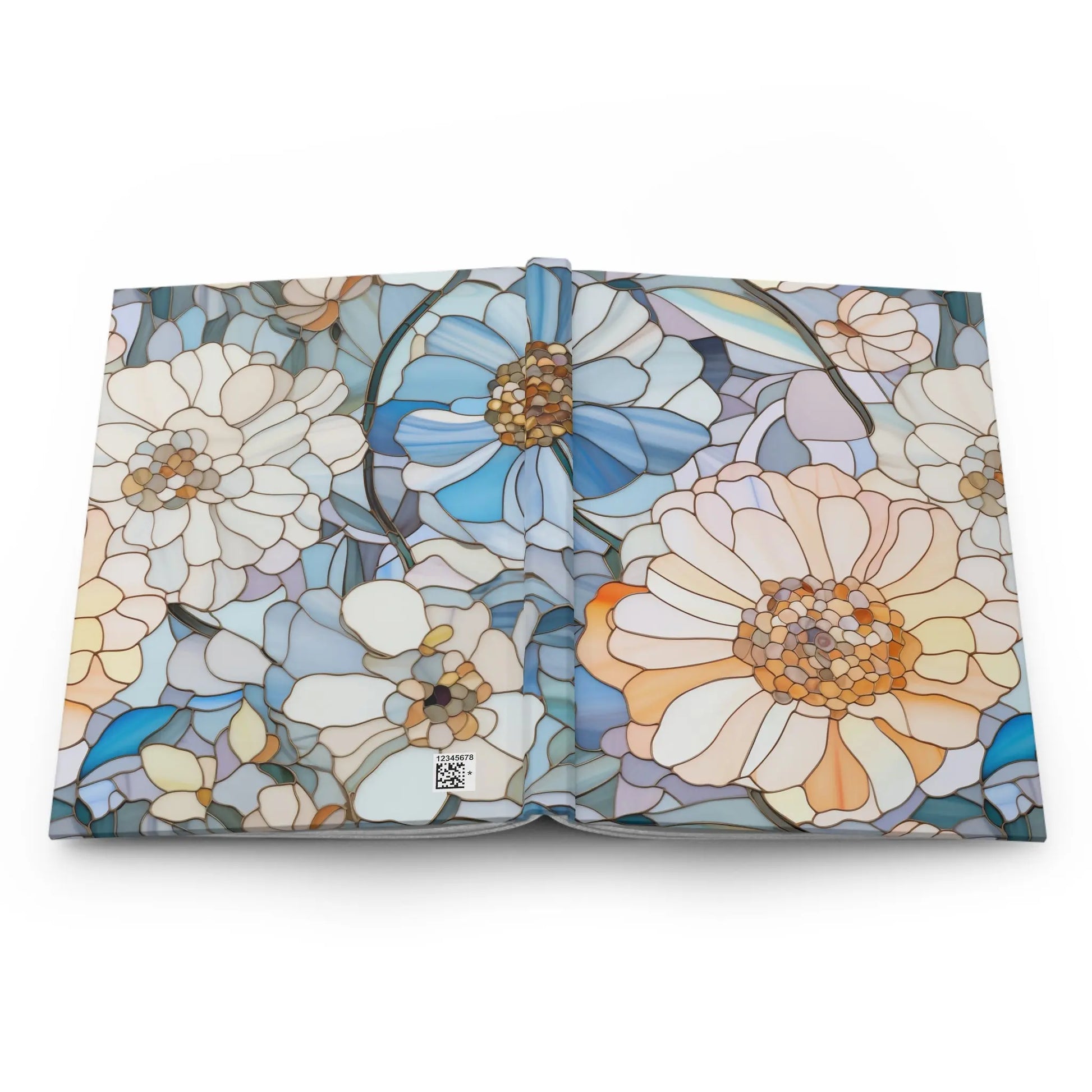 The Stained Glass Flowers Hardcover Journal resembles a custom piece, featuring vibrant, pastel floral illustrations in blue, white, and peach. The intricate stained glass-inspired patterns make it an ideal gift for art lovers.