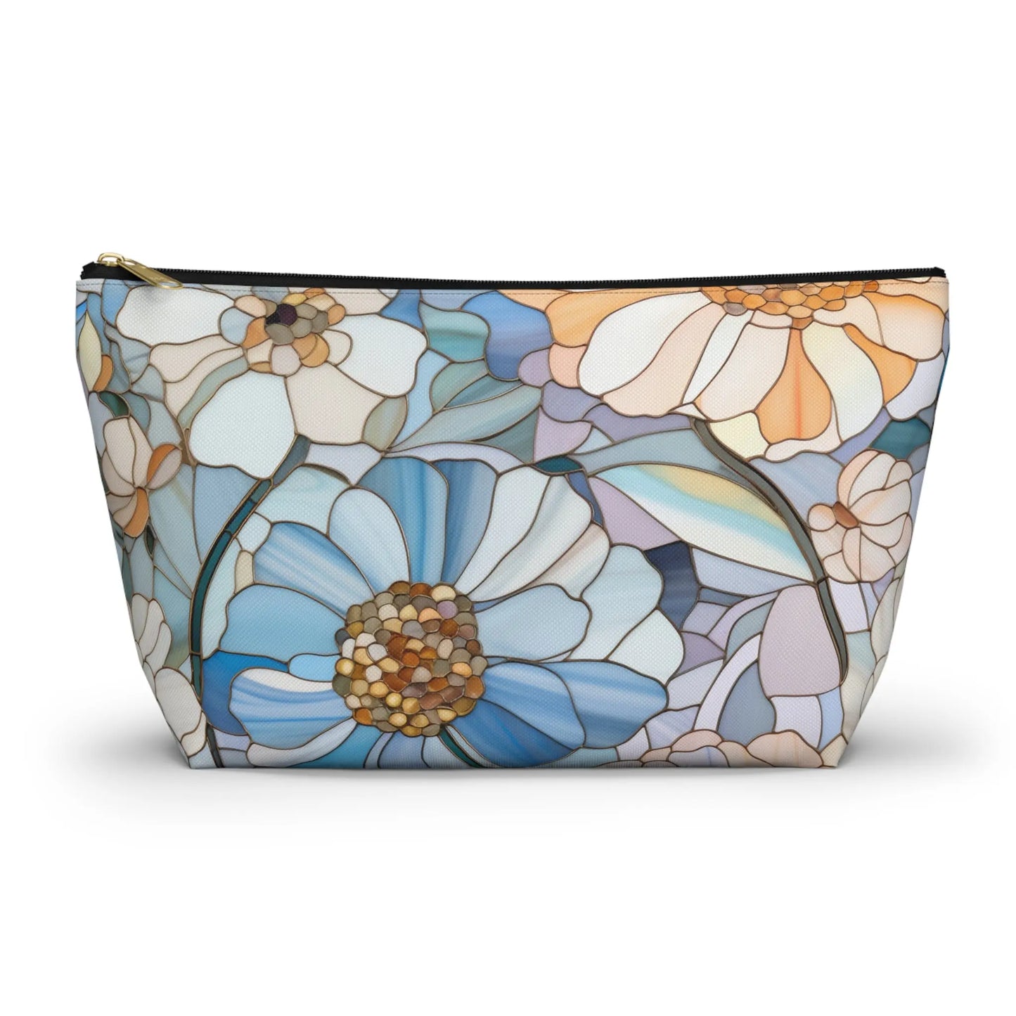 The Stained Glass Flowers Cosmetic Bag features a flat bottom and zipper, adorned with a stained glass pattern of large blue, white, and yellow flowers with green leaves. It adds an elegant touch to your boho collection.