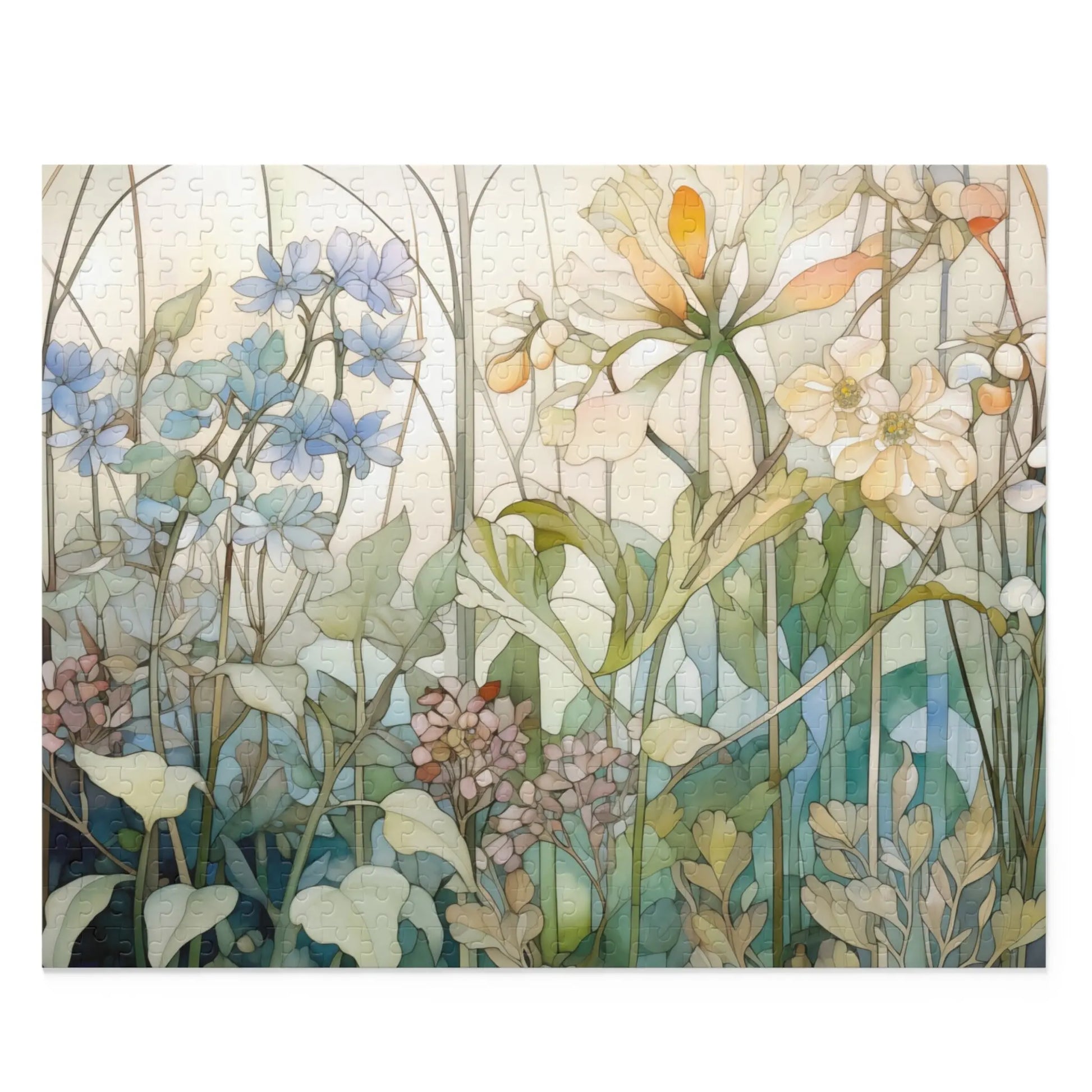 The Summer Wildflowers Jigsaw Puzzle reveals a watercolor scene of blue, white, and orange blooms with green leaves on a light background—perfect as a stained glass gift for nature lovers.