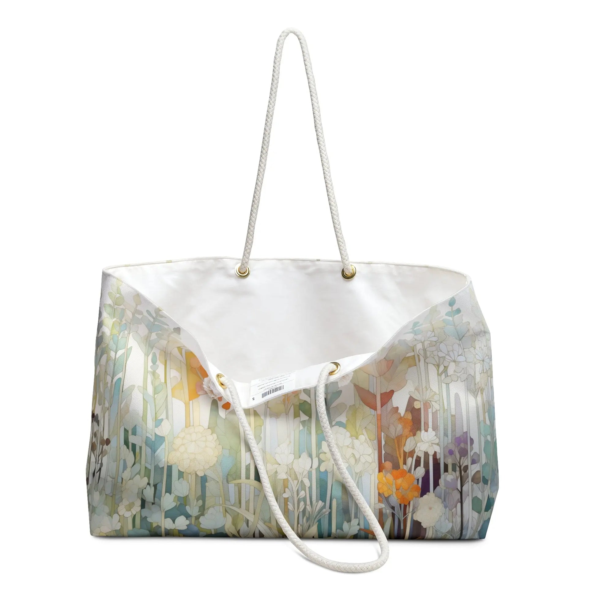 The Stained Glass Pastel Flowers Oversized Tote Bag features a floral design in white, orange, and green with rope handles. Its spacious white interior is ideal for carrying essentials, while the stained glass style adds an artistic touch.