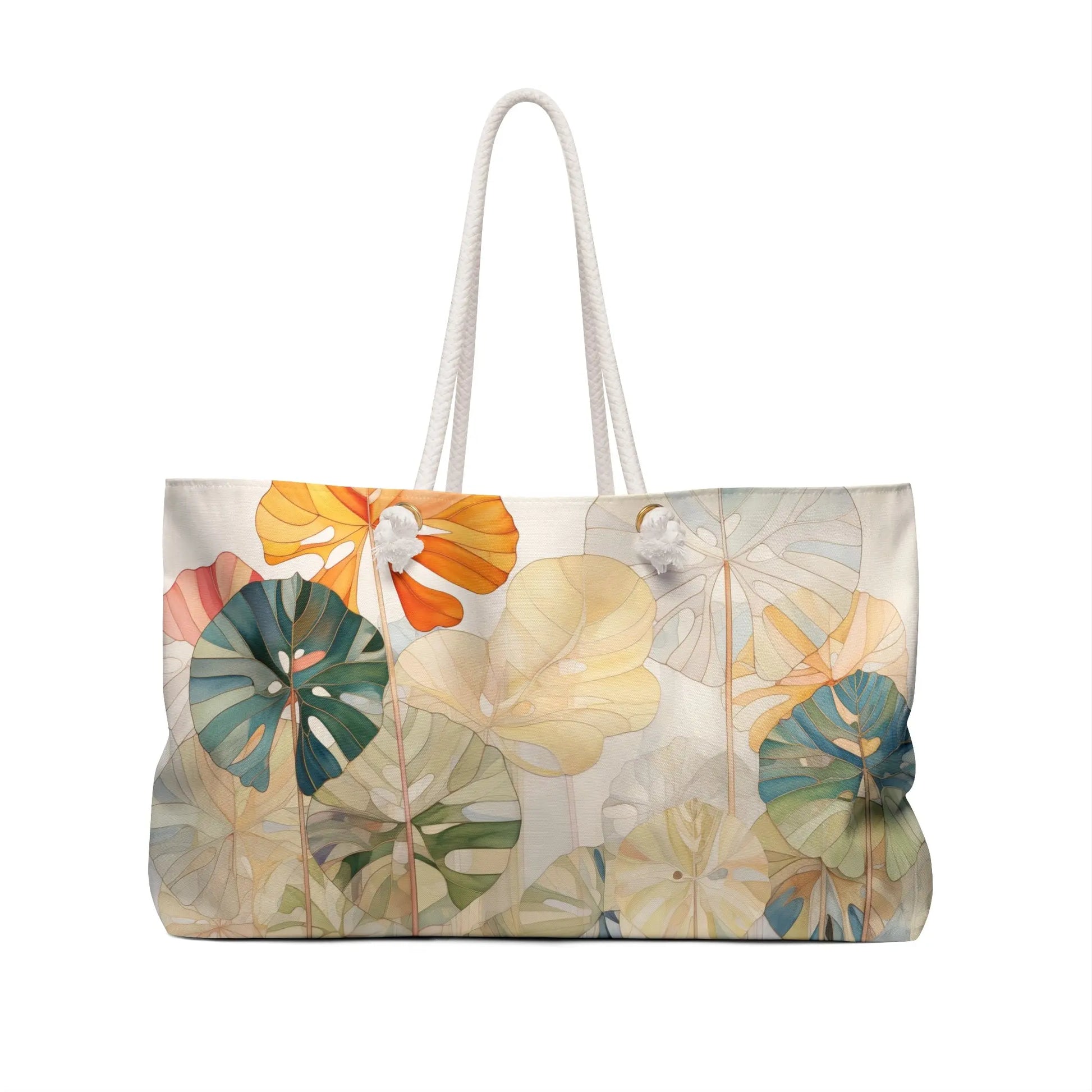 The Stained Glass Monstera Oversized Tote Bag features rope handles and an artistic monstera print, displaying vibrant green, orange, and blue tropical leaves on a light background.