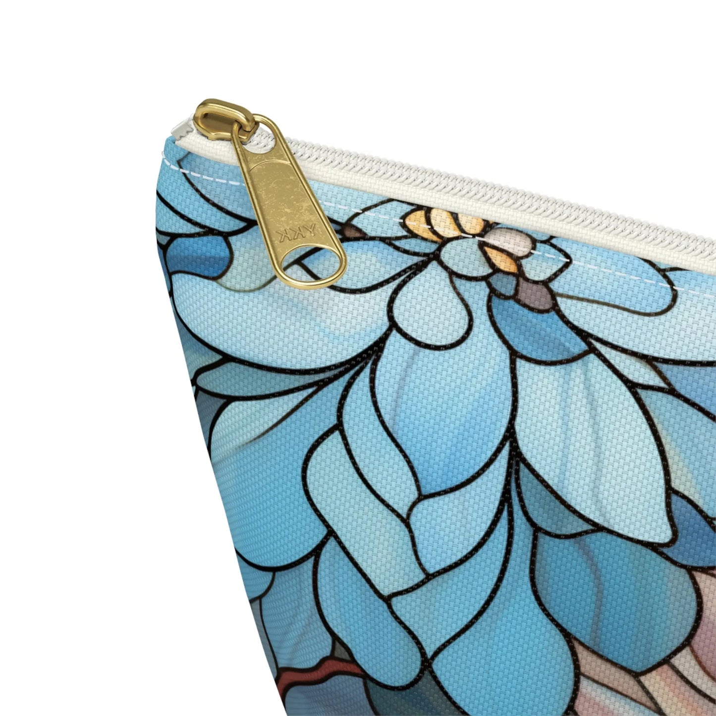 The Stained Glass Dark Flowers Cosmetic Bag showcases a blue and white floral design with a gold zipper, blending style and functionality in its textured boho pouch.