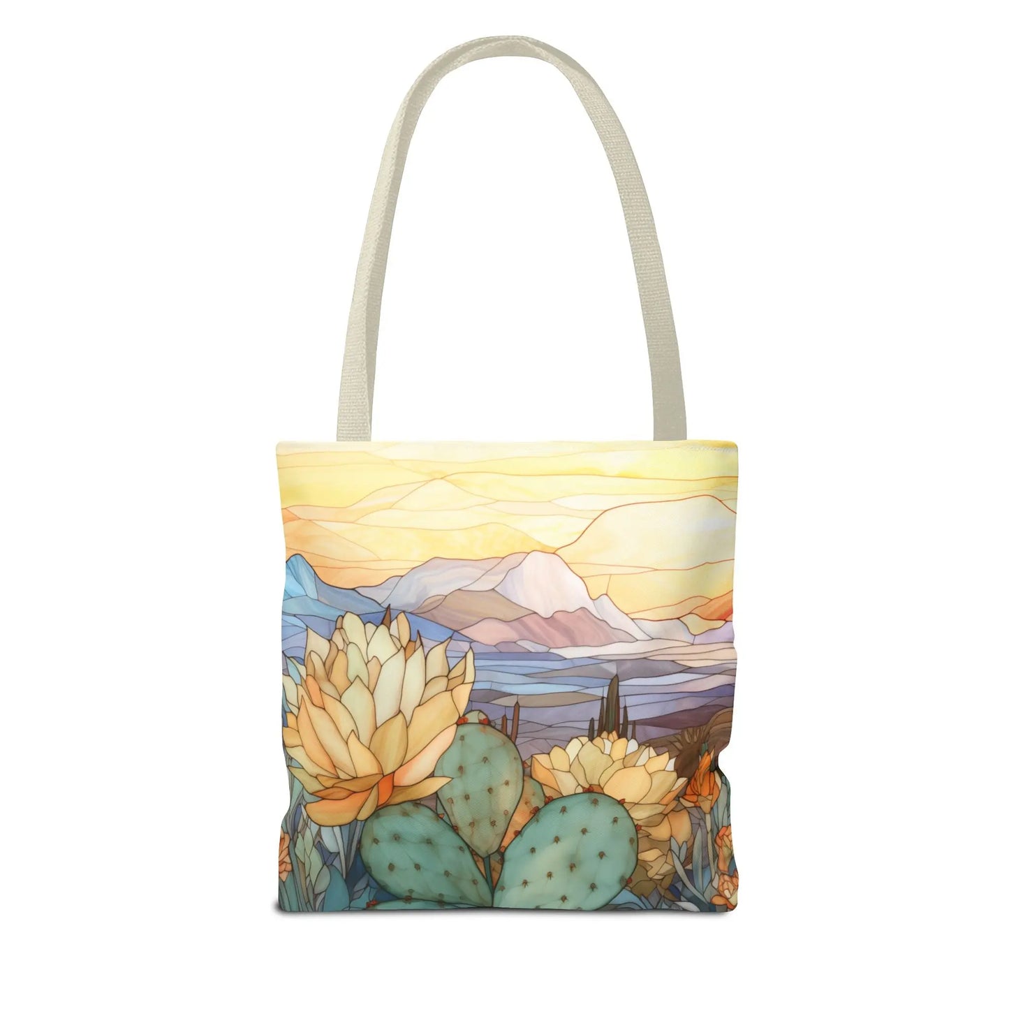The Stained Glass Desert Cactus Tote Bag features an original artists design of a colorful desert landscape with cacti, flowers, mountains, and a vibrant sky, all crafted from durable polyester. Three sizes available.