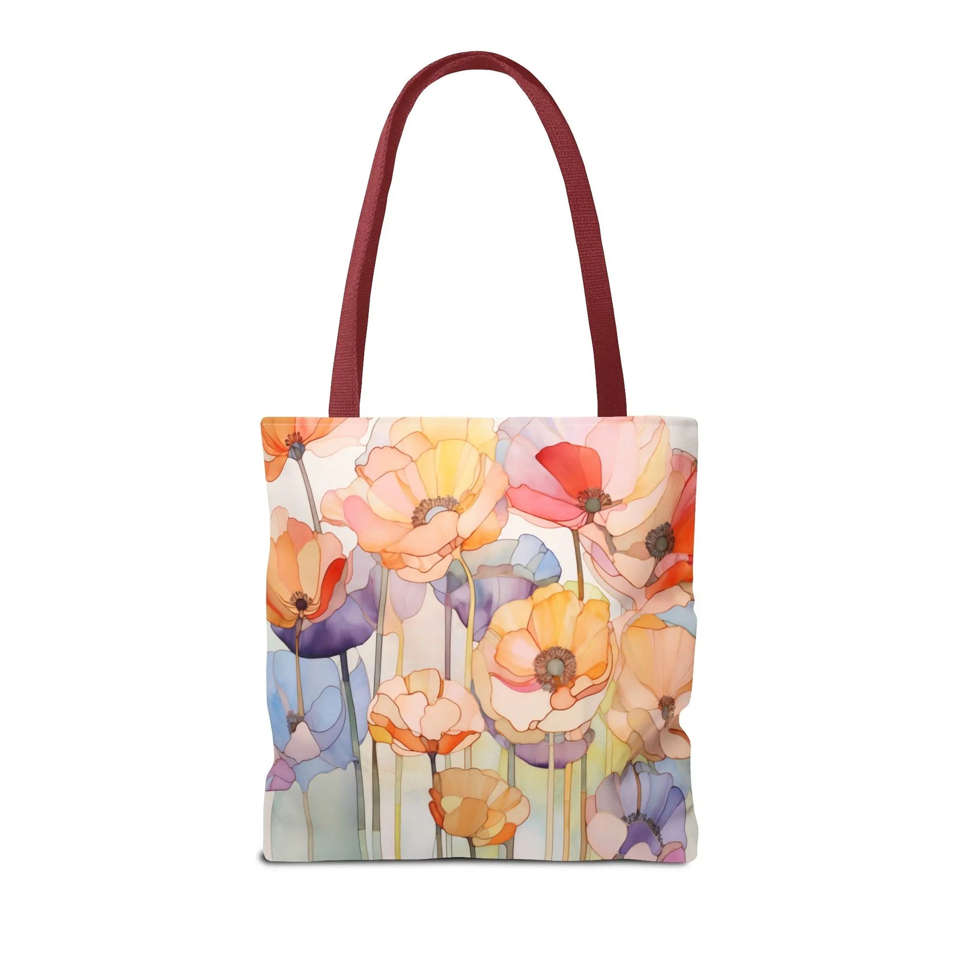 The Stained Glass Poppy Flowers Tote Bag showcases a floral design with vibrant orange, pink, yellow, and purple blossoms on a light background. Made from durable polyester, it features dark red handles for easy carrying and is available in three sizes.