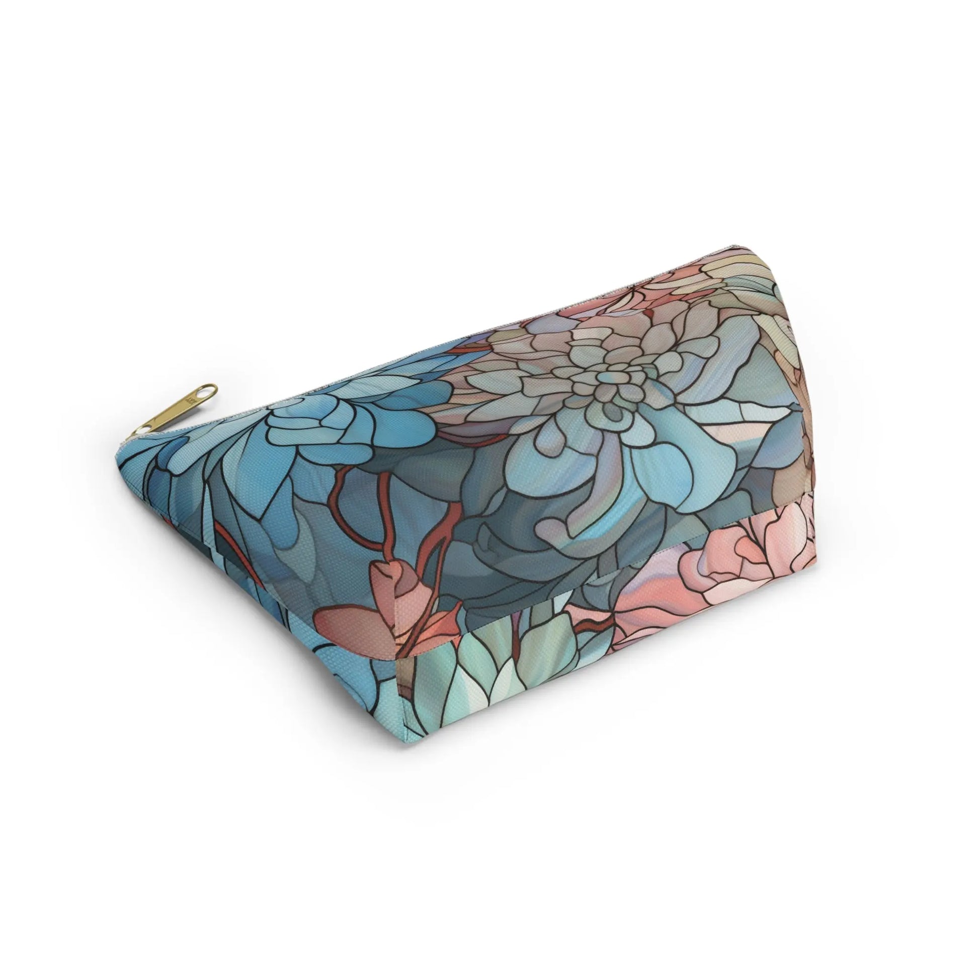 The Stained Glass Dark Flowers Cosmetic Bag is a perfect boho gift, featuring a floral pattern in blue, pink, and green with large overlapping flowers. Its gold zipper adds elegance to the triangular design for a modern and colorful look.
