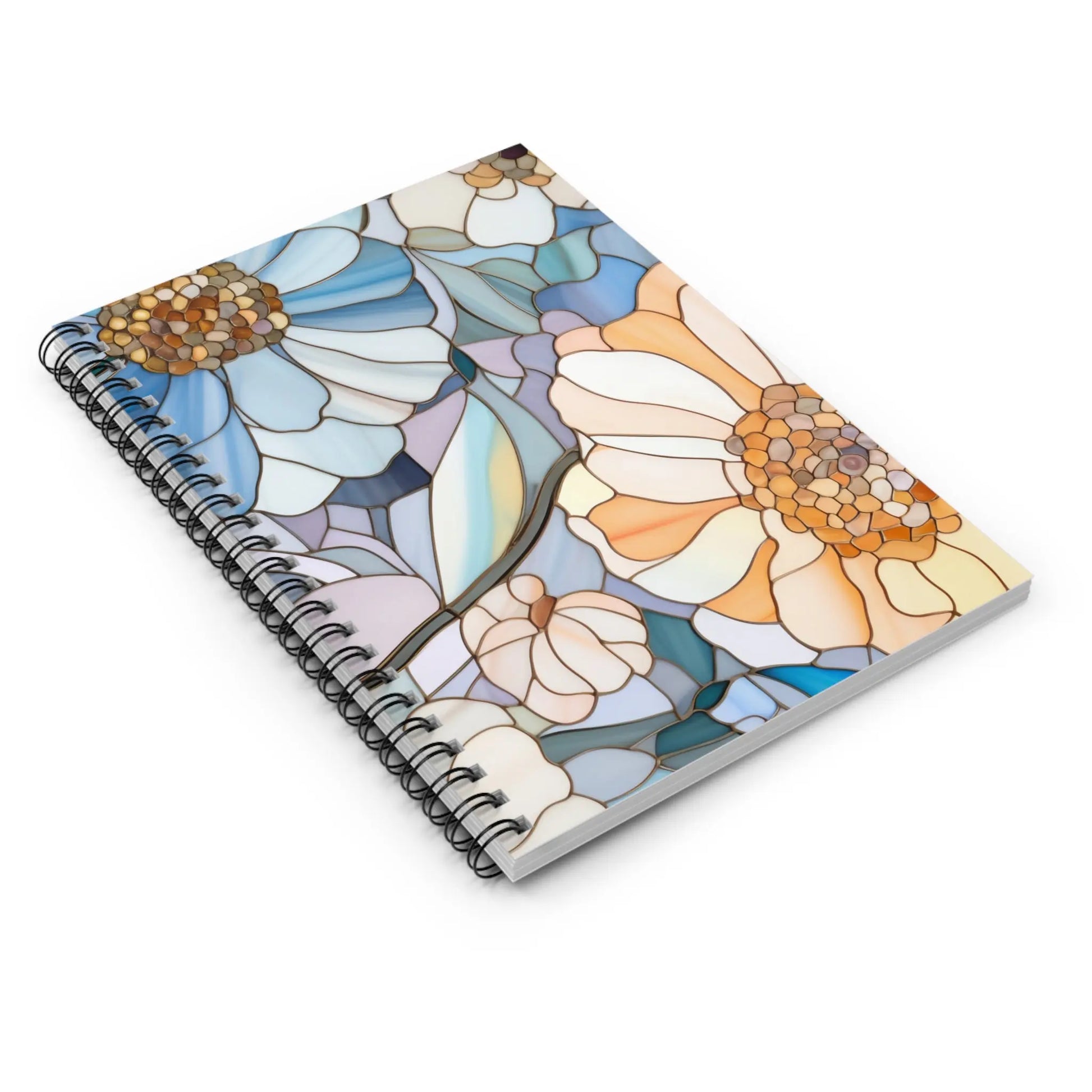The Stained Glass Flowers Spiral Notebook features a stunning cover with a bespoke floral design in blue, orange, and cream, resembling a captivating mosaic.