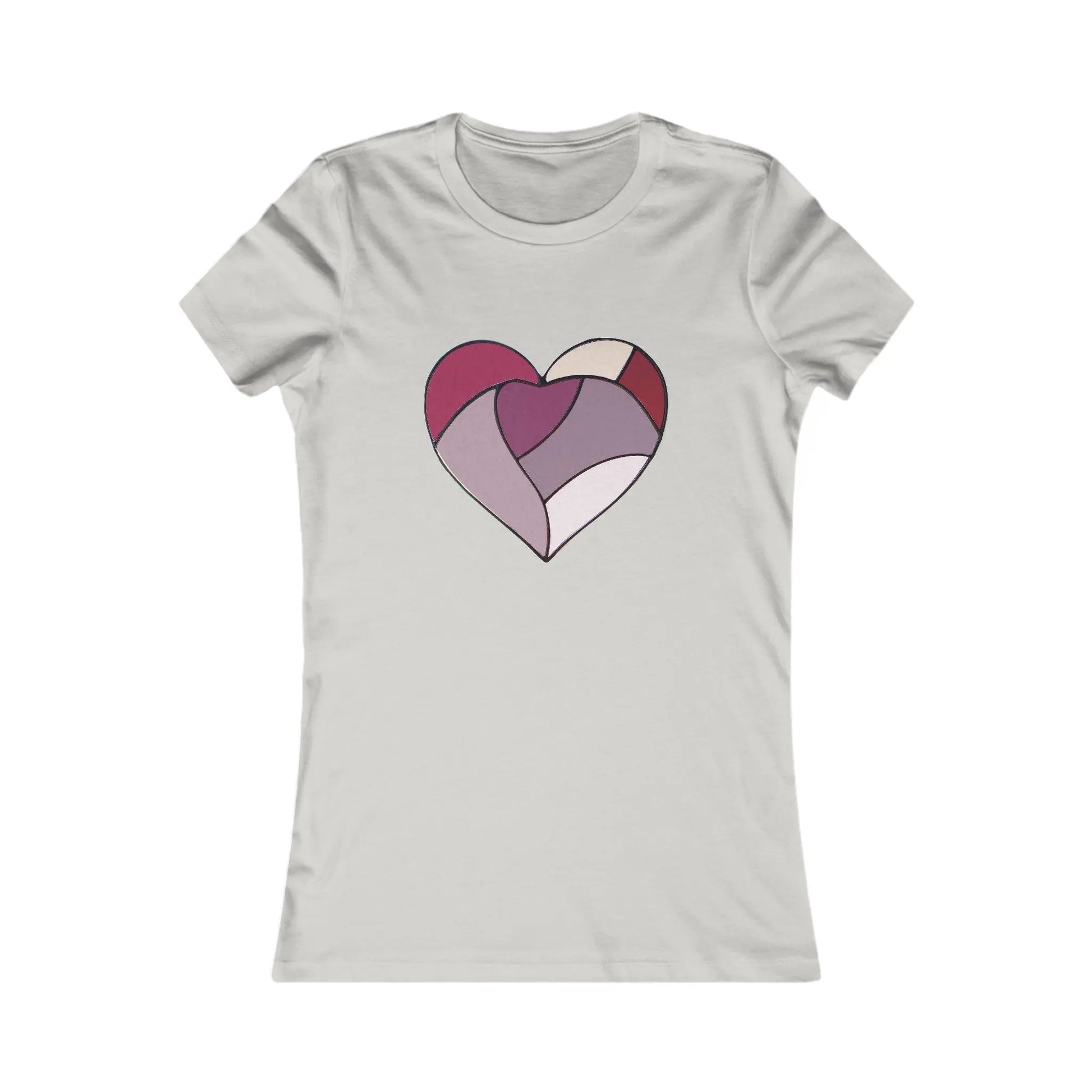 The Stained Glass Heart Womens Tee Shirt is a sustainable light gray fitted t-shirt featuring a central heart design inspired by stained glass. The heart consists of abstract geometric shapes in purple, pink, and cream shades.