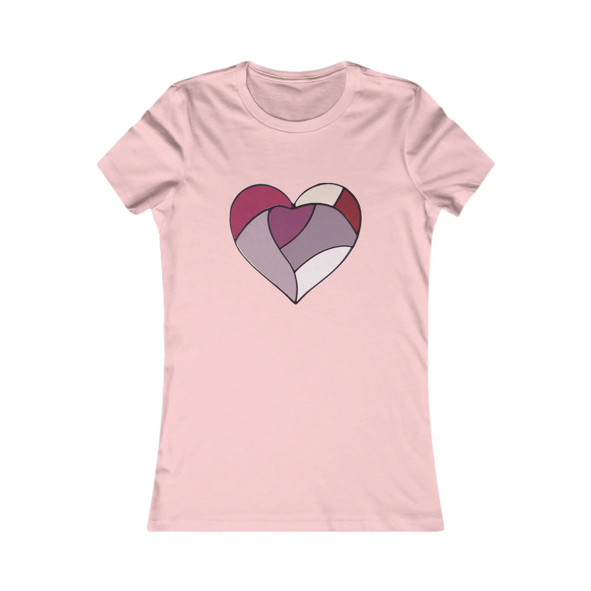 The Stained Glass Heart Womens Tee Shirt is a pink T-shirt with a heart design in the center, crafted from pink, red, and cream-colored stained glass pattern segments.