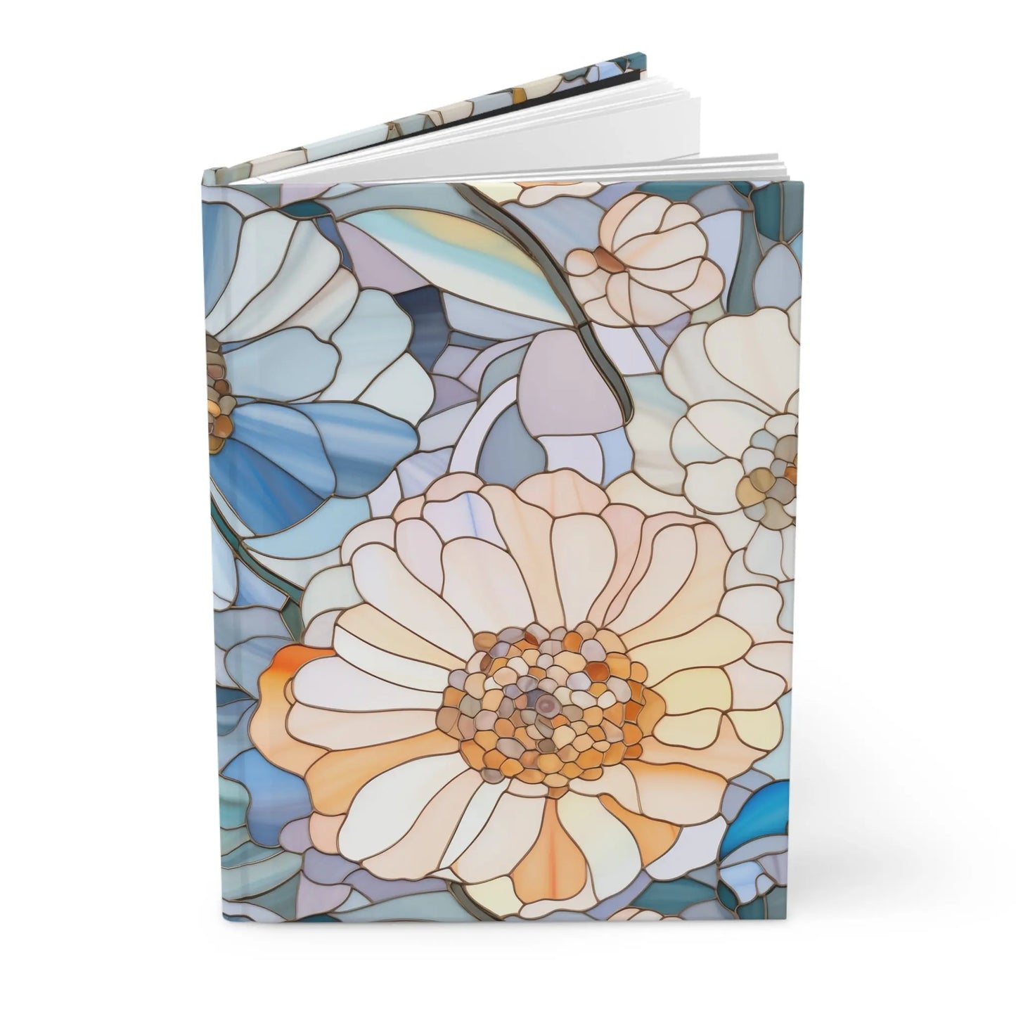 The Stained Glass Flowers Hardcover Journal features a cover with abstract stained glass-style flowers in blue, white, and orange hues. The intricate floral design offers a colorful, artistic look. Slightly open pages make this an ideal gift for stained glass enthusiasts.