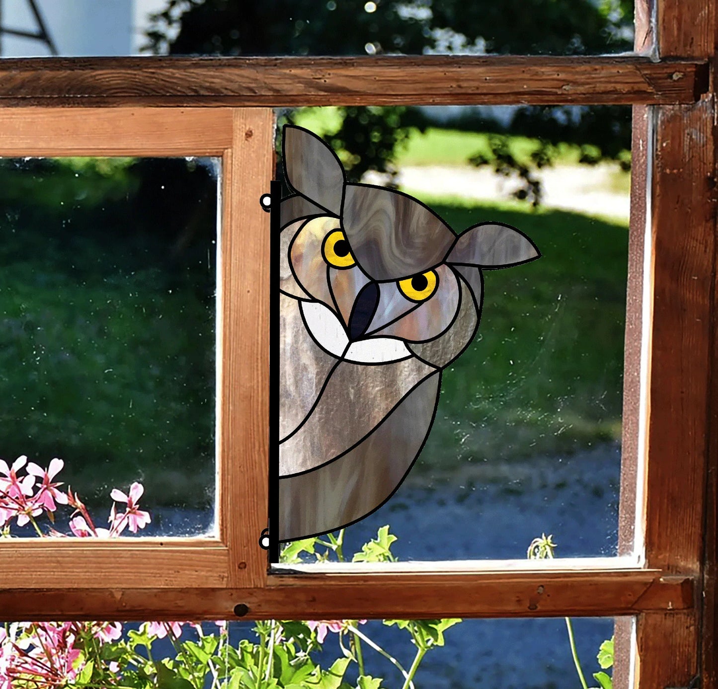 This intermediate stained glass owl design is set in a wooden window frame, featuring pink flowers with a blurred green garden. Ideal for digital pattern downloads, it suits hobbyists and commercial uses. Part of the Animal Stained Glass Pattern 9-Pack for crafters.