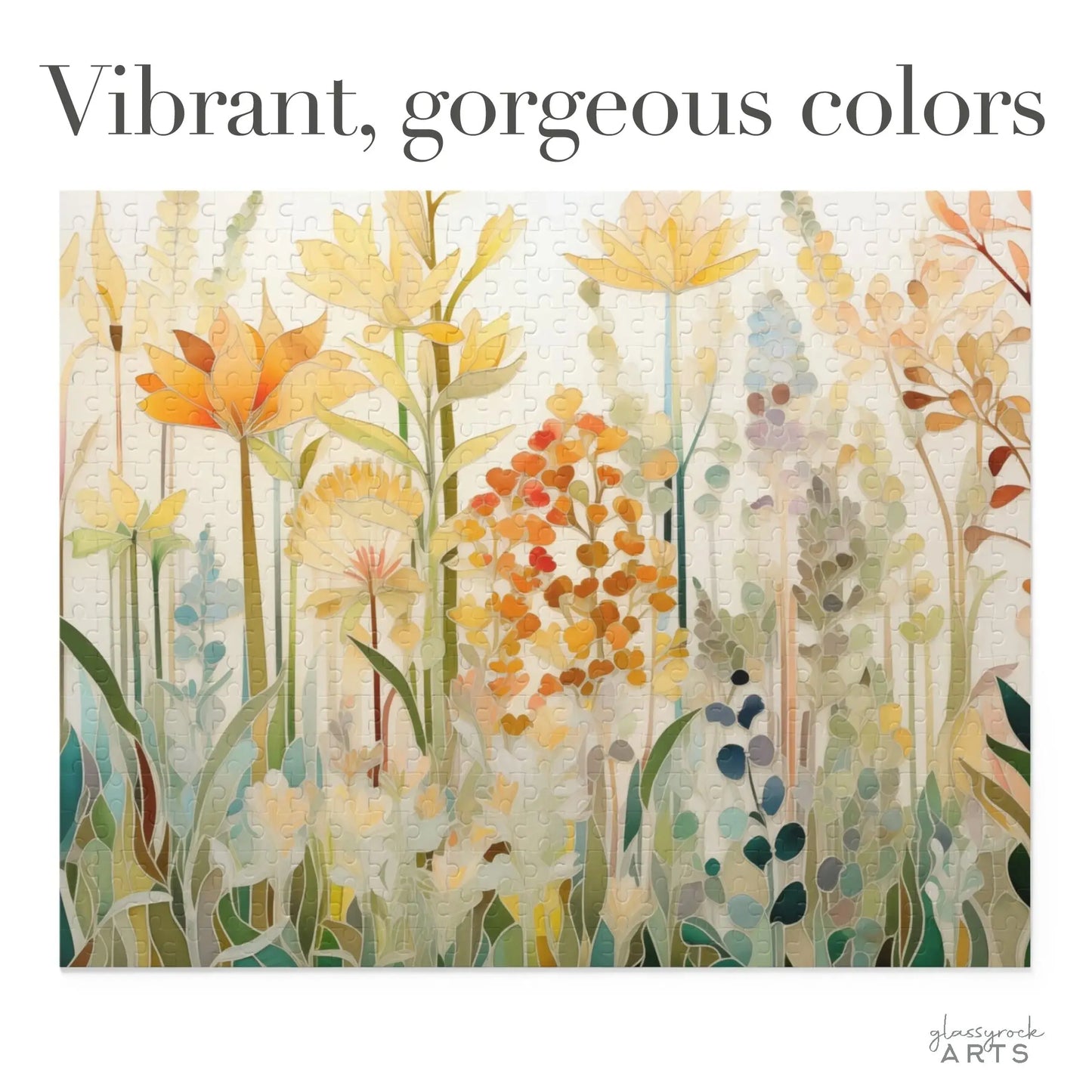 The Autumn Botanicals Jigsaw Puzzle features a watercolor-style illustration of flowers and plants in vibrant yellow, orange, and green. The phrase Vibrant, gorgeous colors is at the top. This art gift puzzle is crafted by glassrock ARTS.