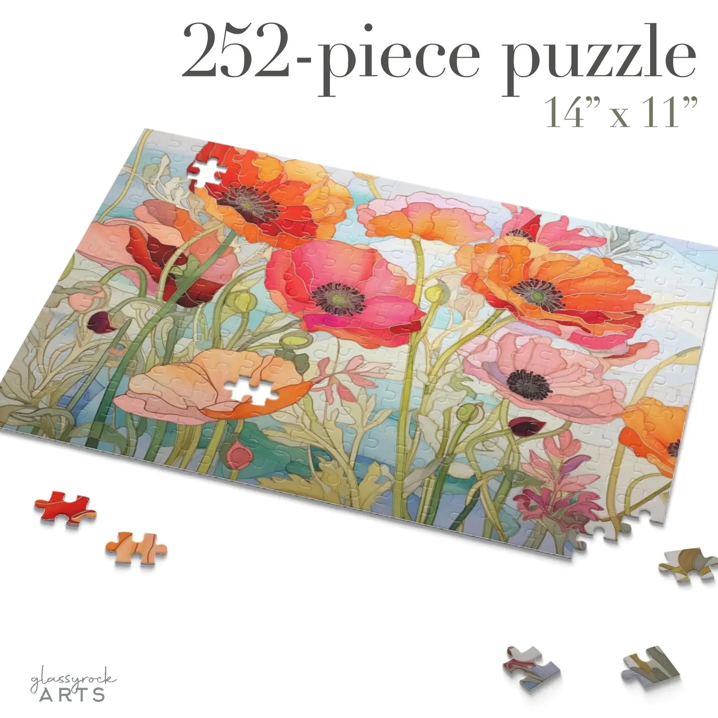 Partially completed on a white surface, the vibrant California Poppies Jigsaw Puzzle features red and pink poppies with green stems. Loose pieces lay scattered around this 252-piece puzzle, measuring 14 x 11, making it an ideal artistic gift for enthusiasts.