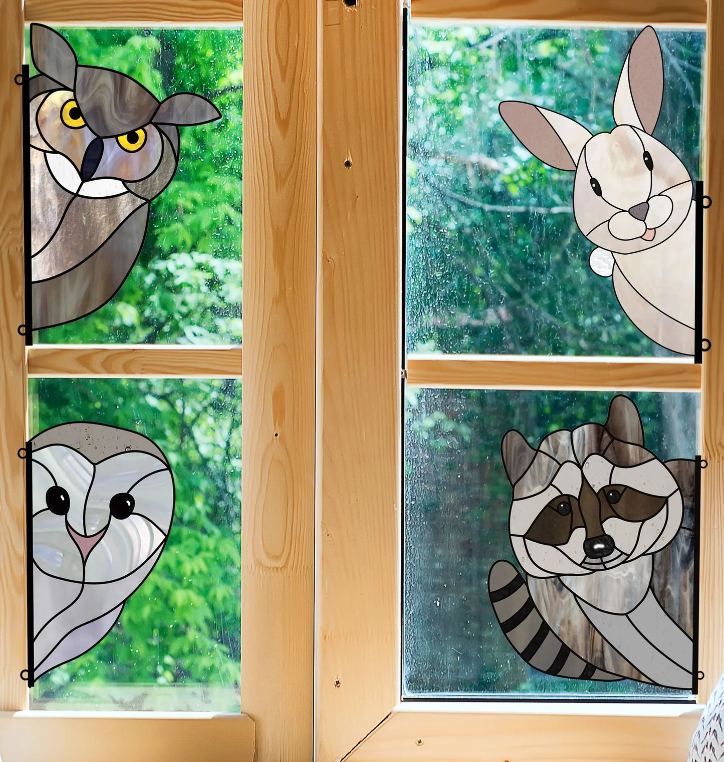 The Animal Stained Glass Pattern 9-Pack features a vibrant four-panel design with an owl, rabbit, barn owl, and raccoon in a wood frame against a leafy green background. Suitable for intermediate levels, digital pattern downloads are available for both hobbyists and commercial use.