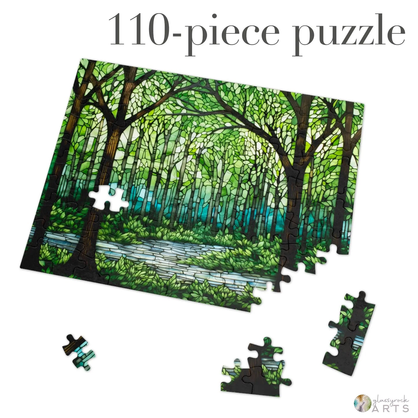 A partially completed Stained Glass Forest Jigsaw Puzzle, featuring a 110-piece lush forest scene with a pathway, has several detached pieces placed nearby. The logo disneyphile ARTS suggests its an ideal gift for nature lovers and custom print enthusiasts.