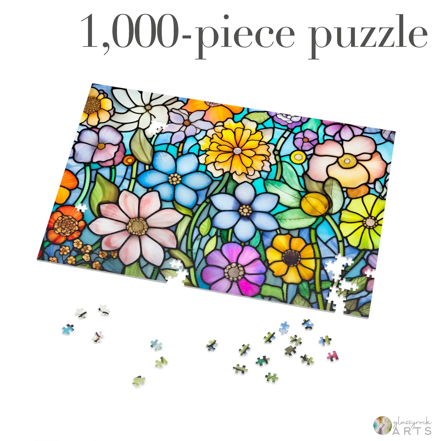 The Stained Glass Flower Garden Jigsaw Puzzle features vibrant floral designs on high-quality chipboard pieces, scattered around the central section for a delightful challenge. 1,000-piece puzzle is prominently displayed at the top, making it an ideal gift for puzzle enthusiasts.