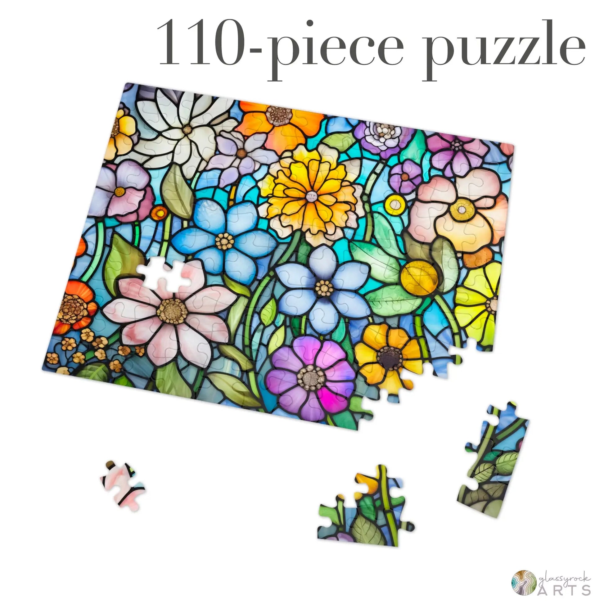 The Stained Glass Flower Garden Jigsaw Puzzle is a vibrant, 110-piece puzzle showcasing a colorful floral design with varied flowers and greenery. Made of high-quality chipboard, some pieces are detached and scattered, ideal as a thoughtful gift for puzzle enthusiasts.