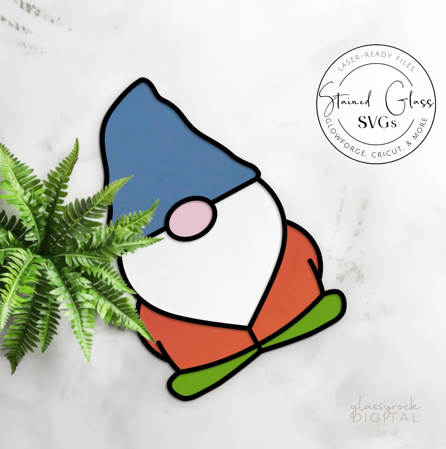 The Stained Glass Gnome SVGs depict a cartoon gnome with a blue hat, white beard, and orange outfit against a light backdrop. A vibrant fern accents the left side as a circular logo peeks from the top right, creating an intricate and whimsical stained glass design.