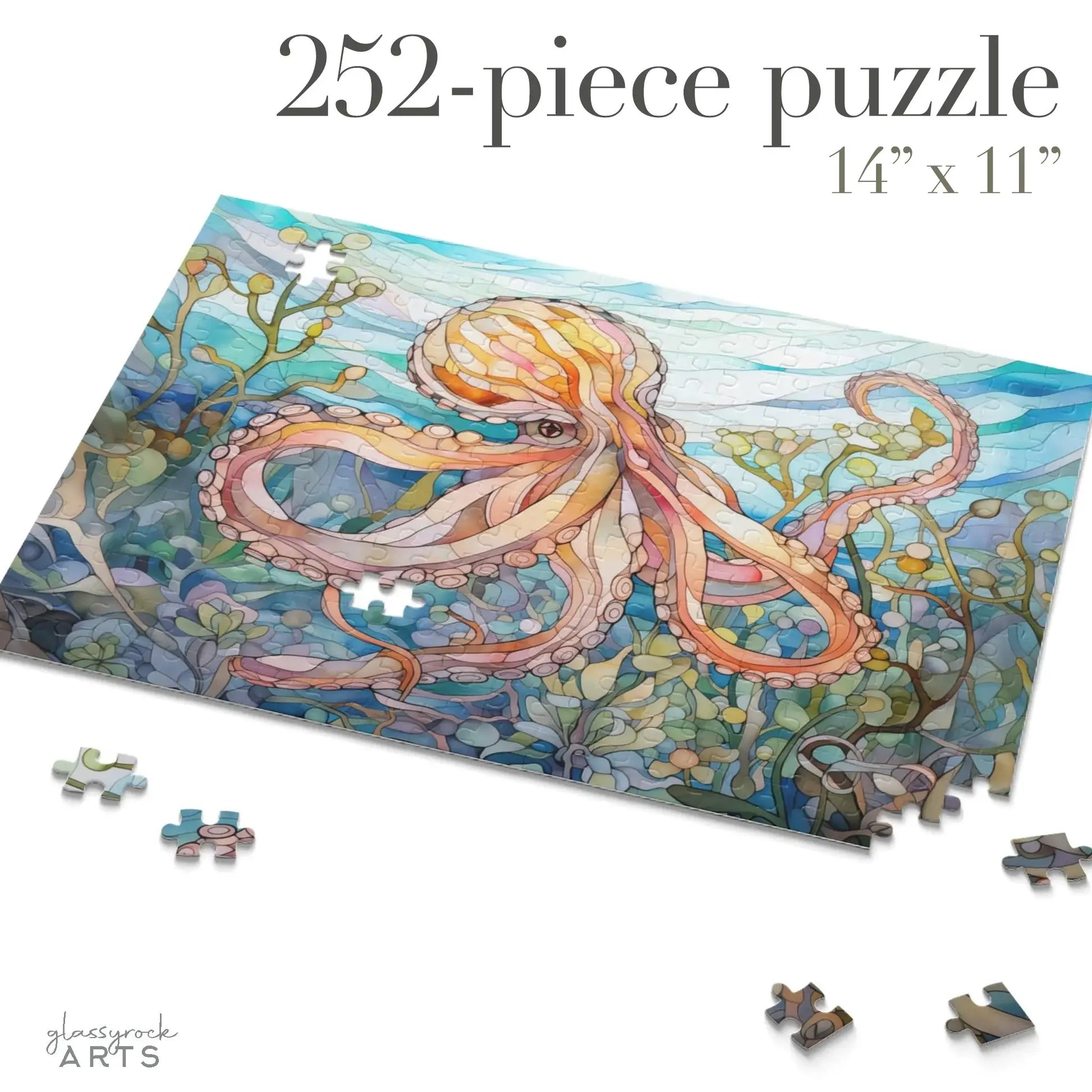 The Stained Glass Octopus Jigsaw Puzzle features a vibrant underwater scene with seaweed and bubbles, inspired by stained glass art. It includes 252 pieces and measures 14 x 11, with scattered pieces around the completed section. Text reads 252-piece puzzle and 14 x 11.