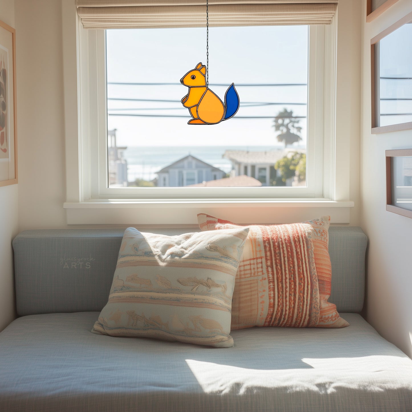 A picture of the Cute Squirrel Stained Glass Christmas Ornament Patterns from GlassyRock Arts.