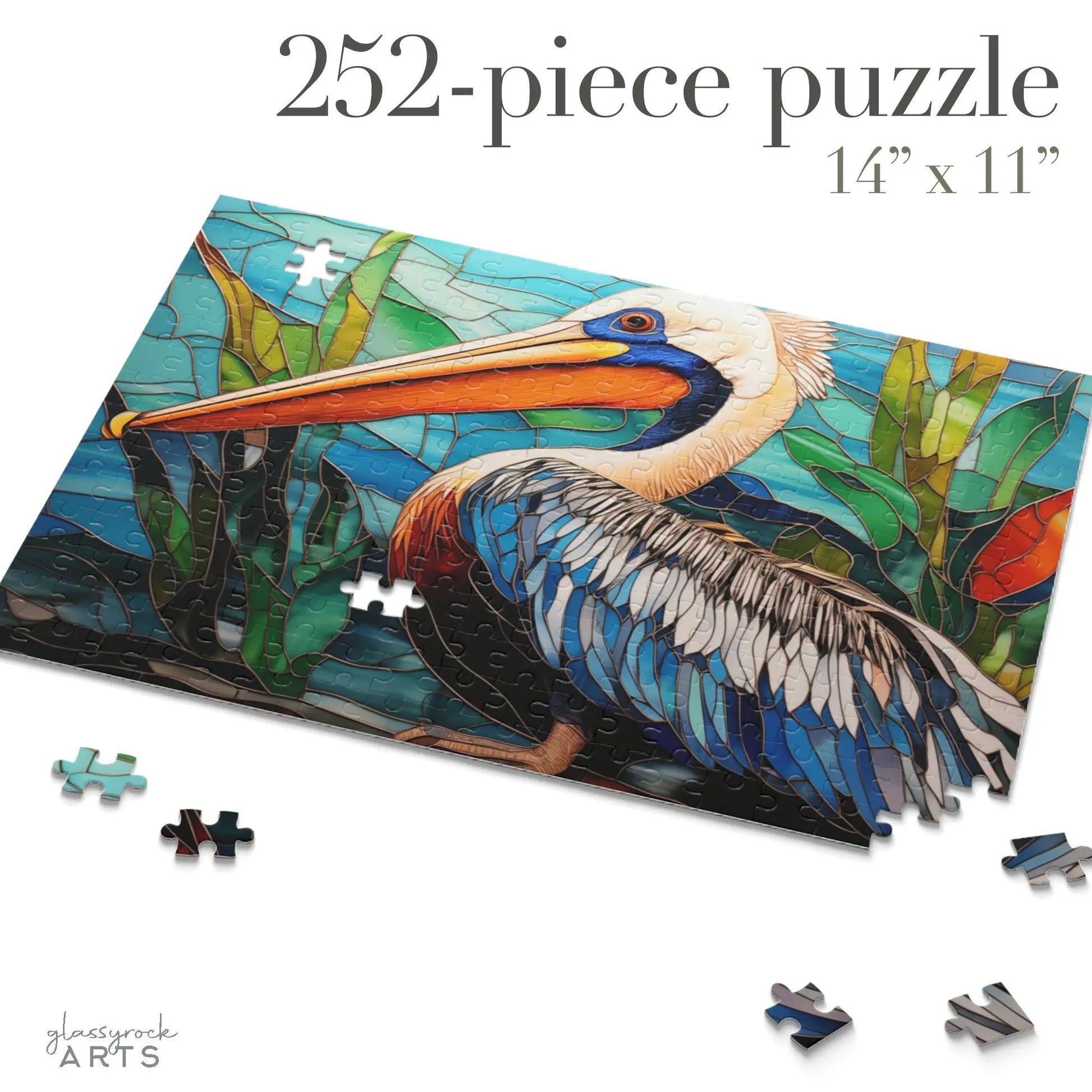 The Stained Glass Pelican Jigsaw Puzzle is a 252-piece set featuring a pelican with vibrant blues, oranges, and greens among green leaves and water. Sized at 14 x 11, scattered pieces reveal its artful beauty, making it an ideal gift for puzzle enthusiasts.