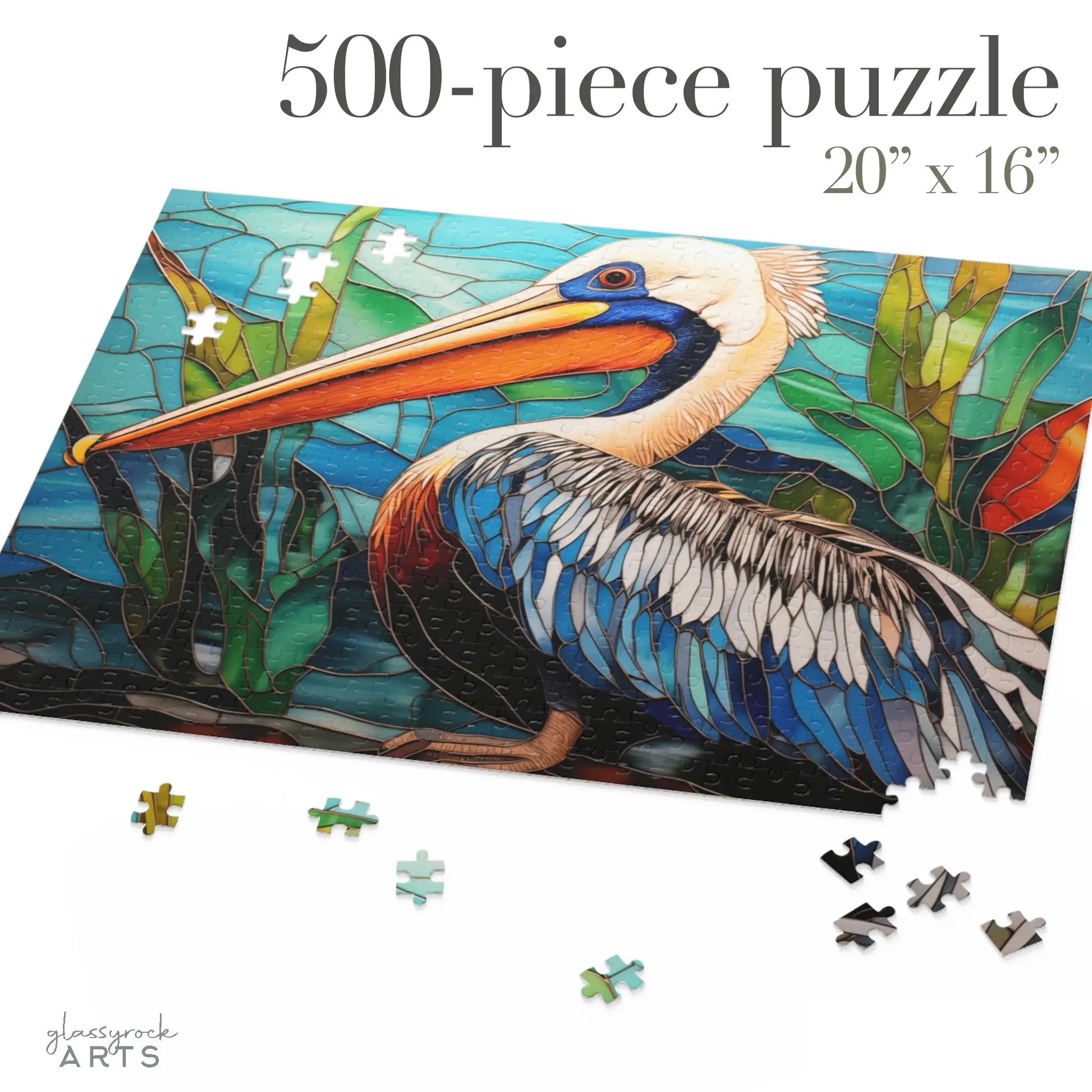 The 500-piece Stained Glass Pelican Jigsaw Puzzle features a vibrant pelican with a long beak, partially assembled on a 20 x 16 white surface. Loose pieces are scattered nearby, making it an ideal art gift or engaging project for couples.
