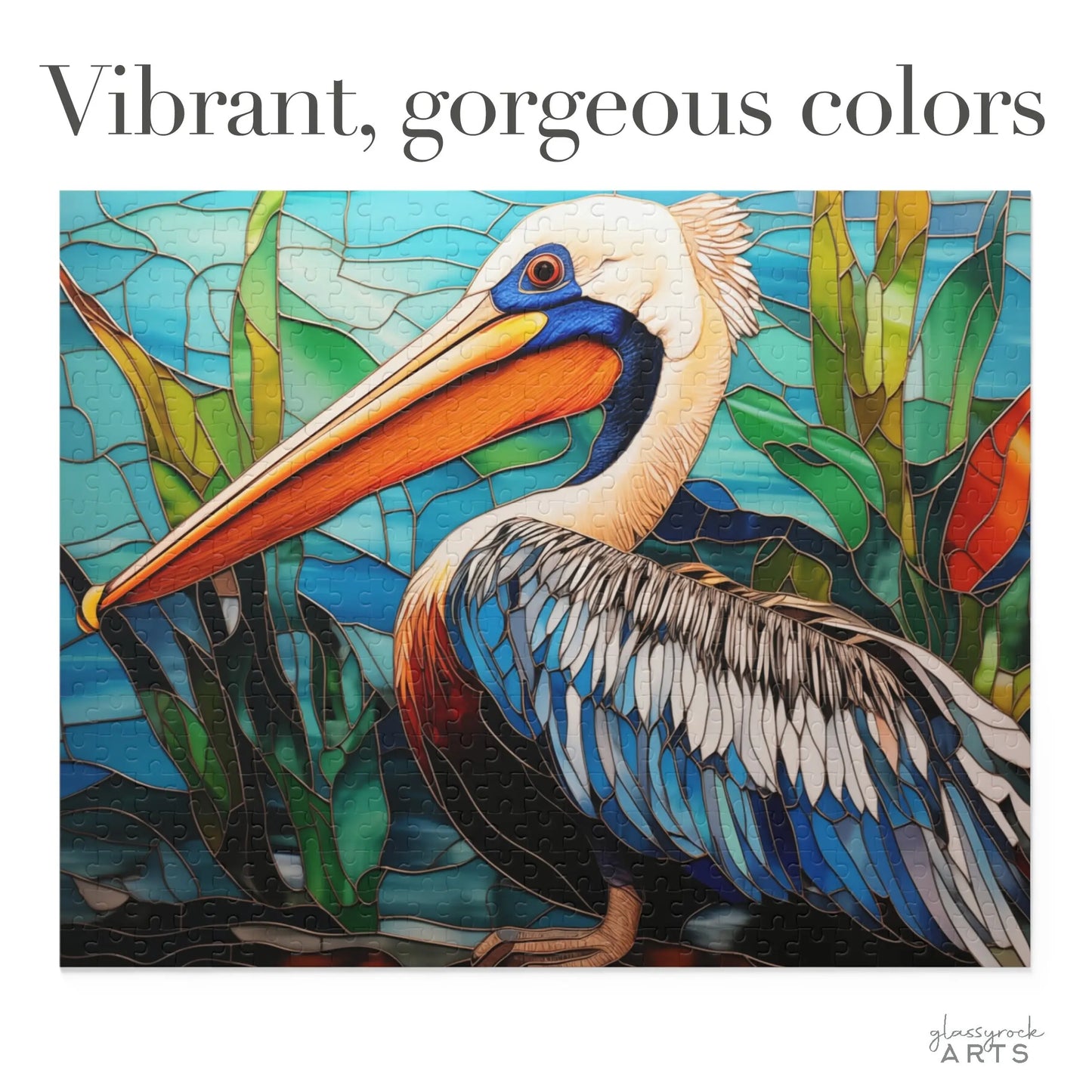 The Stained Glass Pelican Jigsaw Puzzle showcases a colorful pelican with a vivid orange beak against a bright blue and green backdrop with abstract plants. Perfect as an art gift, it features vibrant colors and the glasswork ARTS logo in the corner.