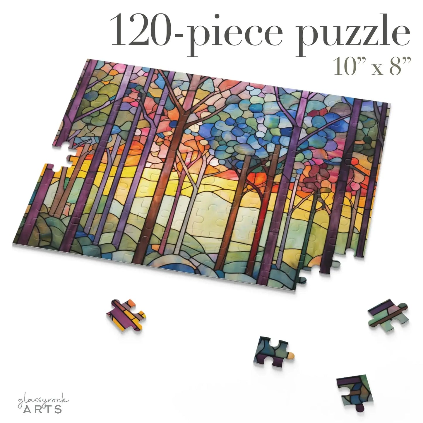 The Rainbow Forest Jigsaw Puzzle is a 120-piece, stained glass-inspired puzzle showcasing a rainbow-colored forest with vibrant trees against a sunset sky. Measuring 10 x 8, this nature gift invites you to piece together colorful leaves and complete the enchanting view.