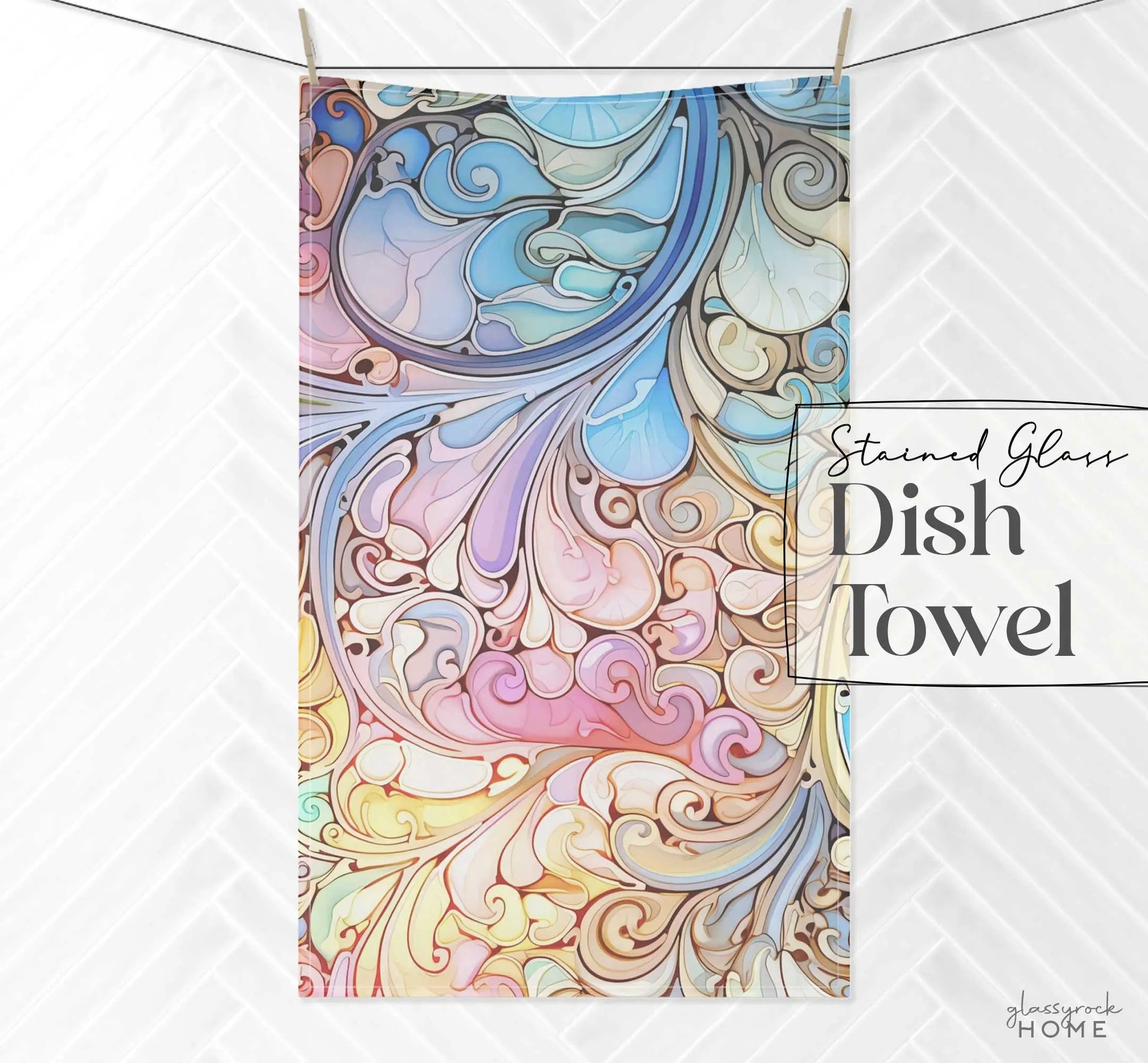 A vibrant dish towel with a stained glass-inspired design features swirling pastel patterns of pink, blue, yellow, and green on a white backdrop. The text reads Rainbow Paisley Dish Towel, ideal for enhancing kitchen aesthetics.