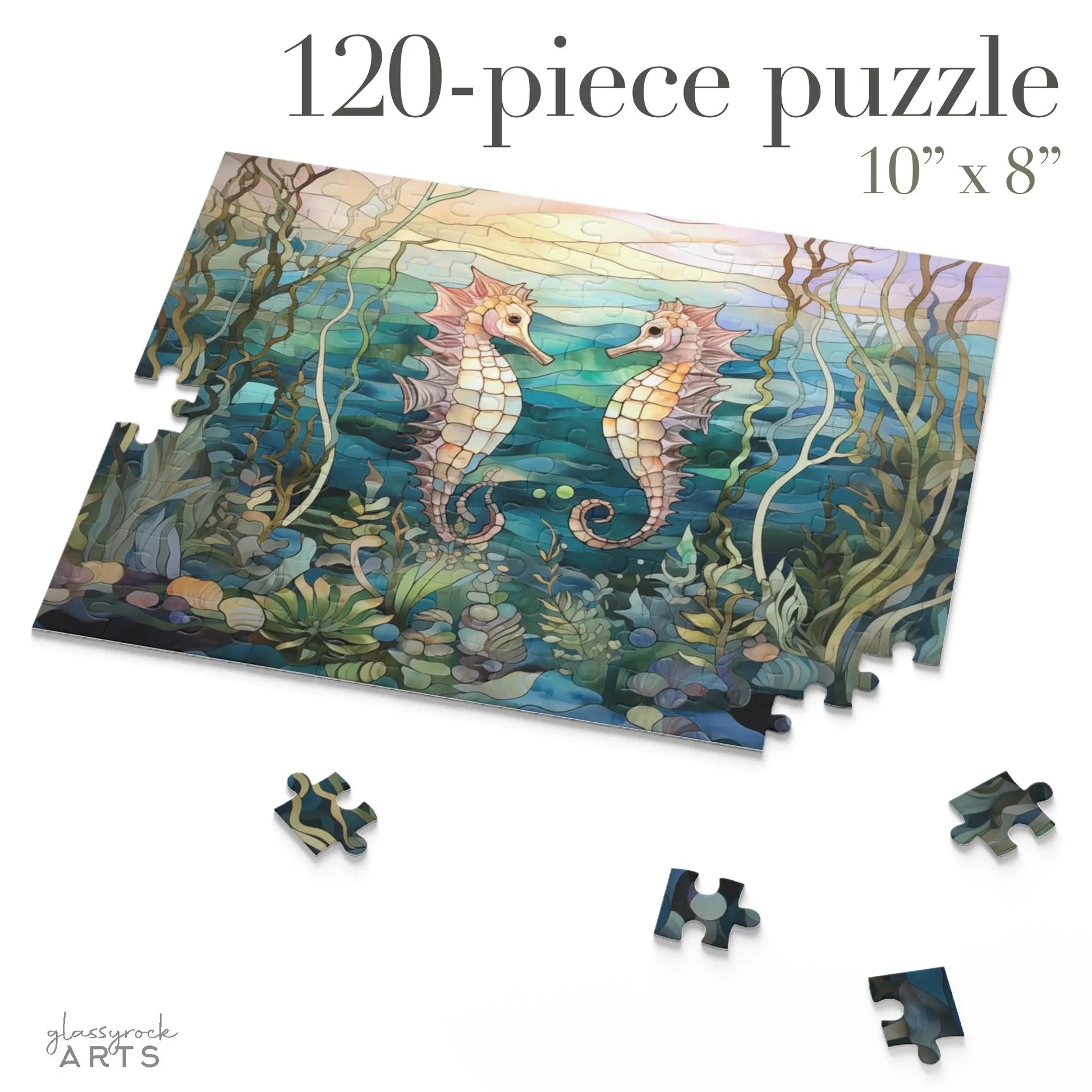 The Stained Glass Seahorses Jigsaw Puzzle, a partially completed 120-piece set measuring 10 x 8, depicts two seahorses facing each other in a vibrant underwater stained glass-like scene with seaweed and rocks. Ideal for nature lovers, some pieces are scattered around the main assembled section.