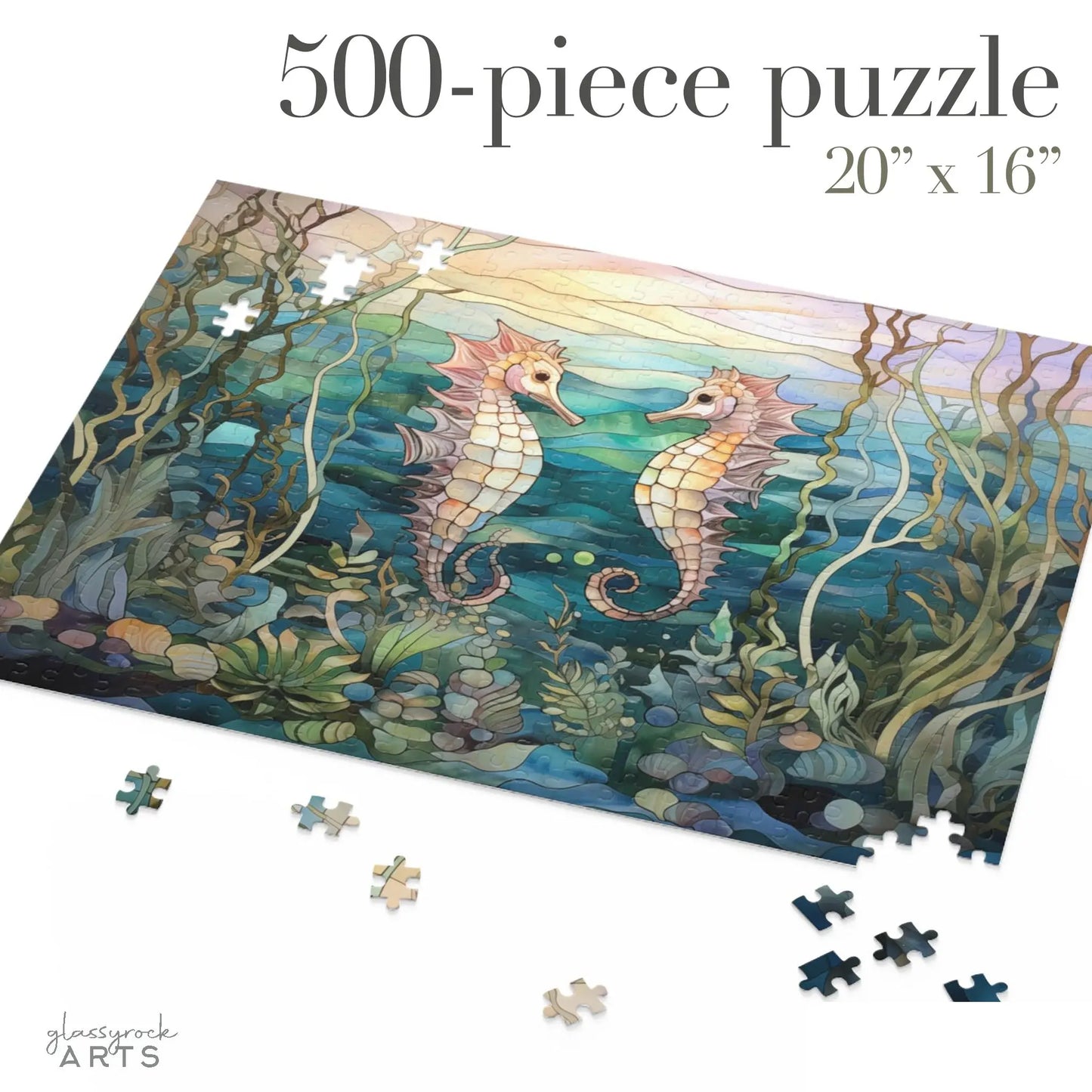 The 500-piece Stained Glass Seahorses Jigsaw Puzzle features two seahorses facing each other amidst seaweed and rocks in a vibrant underwater scene. Measuring 20 x 16, its perfect for nature lover gifts, with scattered pieces inviting you to complete the beautiful picture.
