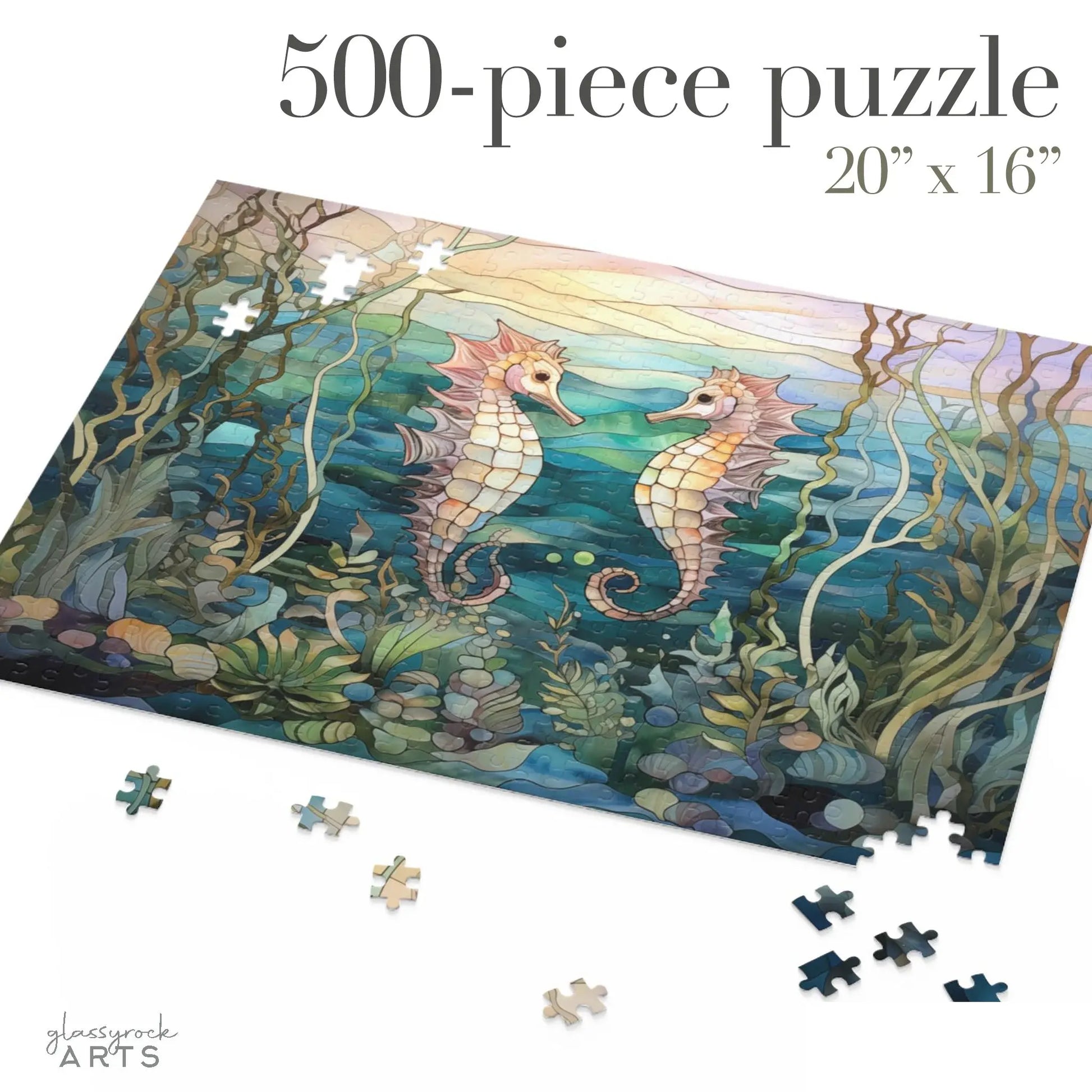 The 500-piece Stained Glass Seahorses Jigsaw Puzzle features two seahorses facing each other amidst seaweed and rocks in a vibrant underwater scene. Measuring 20 x 16, its perfect for nature lover gifts, with scattered pieces inviting you to complete the beautiful picture.