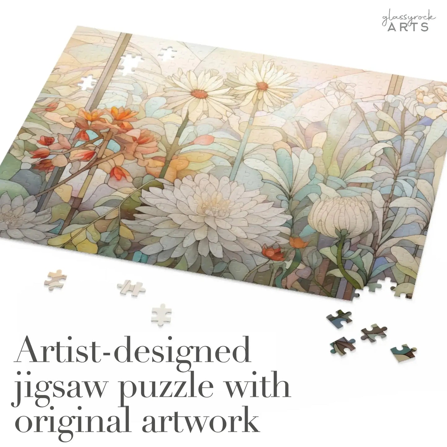 The Spring Botanicals Jigsaw Puzzle, featuring artist-designed floral artwork, displays white and orange blooms with lush green leaves. Some pieces are scattered, completing this perfect gift for mom.