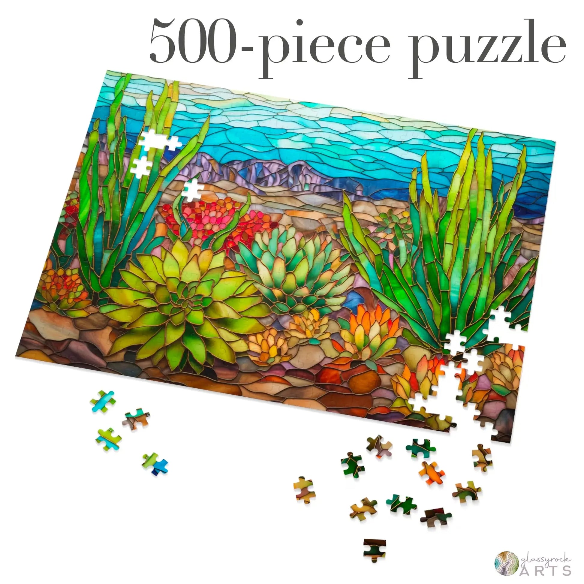 The Stained Glass Succulents Jigsaw Puzzle is a vibrant 500-piece puzzle featuring a desert landscape and colorful succulents. Its perfect for gift-seekers looking to mesmerize and delight, with scattered pieces ready to complete the masterpiece.