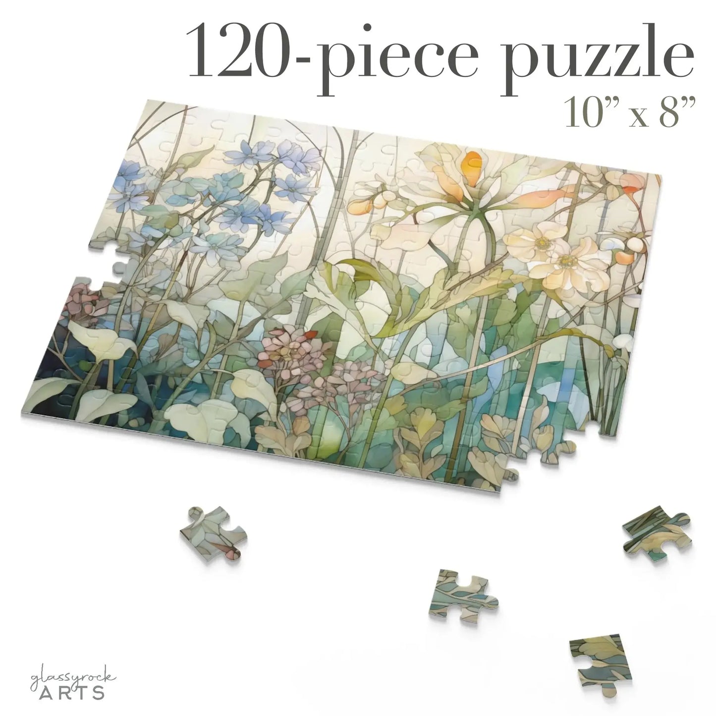 The Summer Wildflowers Jigsaw Puzzle is a 120-piece floral jigsaw featuring blue, white, and pink flowers with green stems and leaves. It measures 10x8 inches and comes with a few scattered pieces—ideal as a tranquil gift for puzzle enthusiasts.