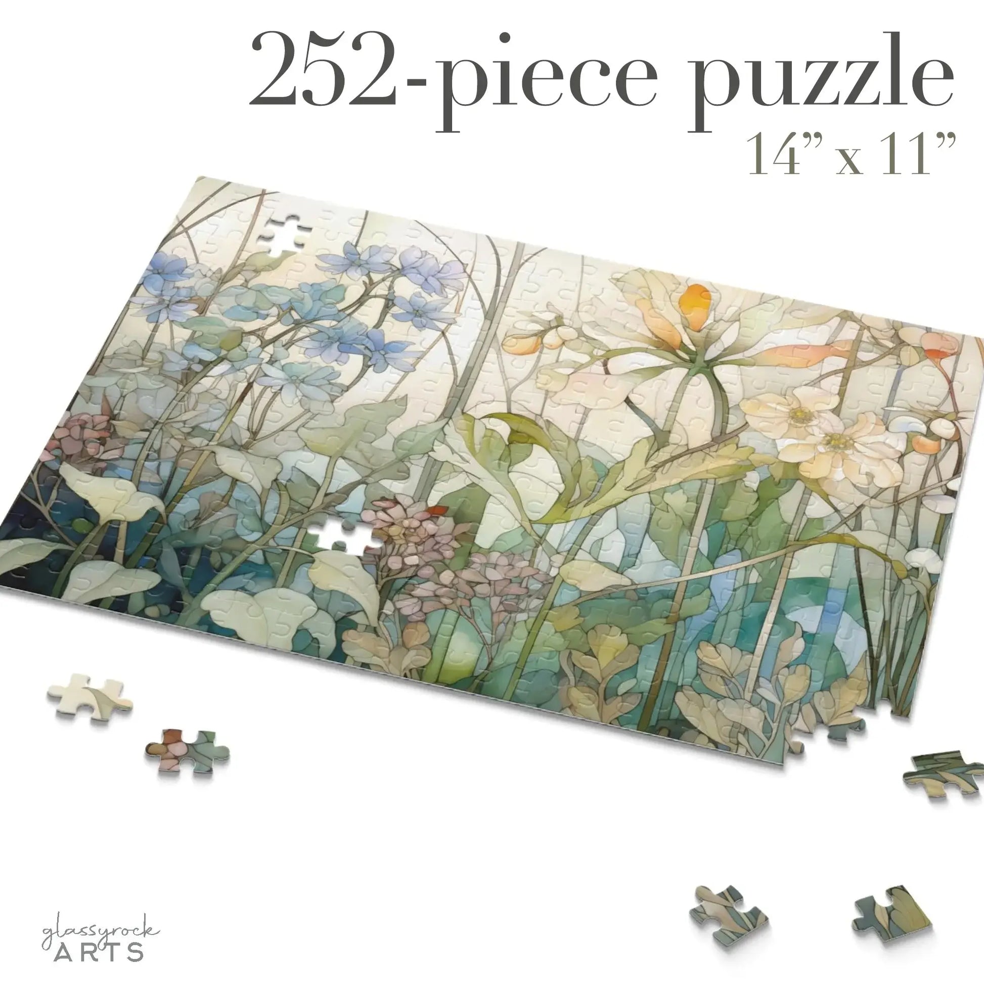 A partially completed 252-piece Summer Wildflowers Jigsaw Puzzle features a floral design with blue and white flowers, green leaves, and measures 14 x 11. Loose pieces scattered around the edges evoke the essence of a botanical scene.