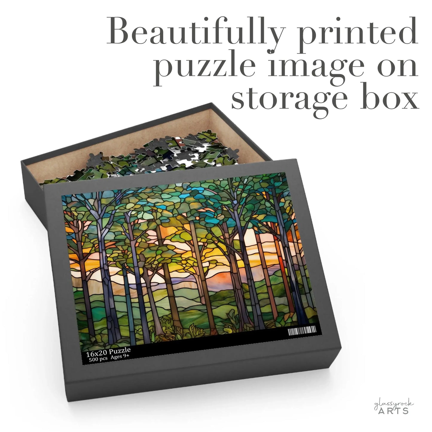 Scattered pieces of the Sunset Forest Jigsaw Puzzle reveal tall trees and vibrant colors. Text above says, Beautifully printed puzzle image on storage box—ideal for any nature enthusiast.