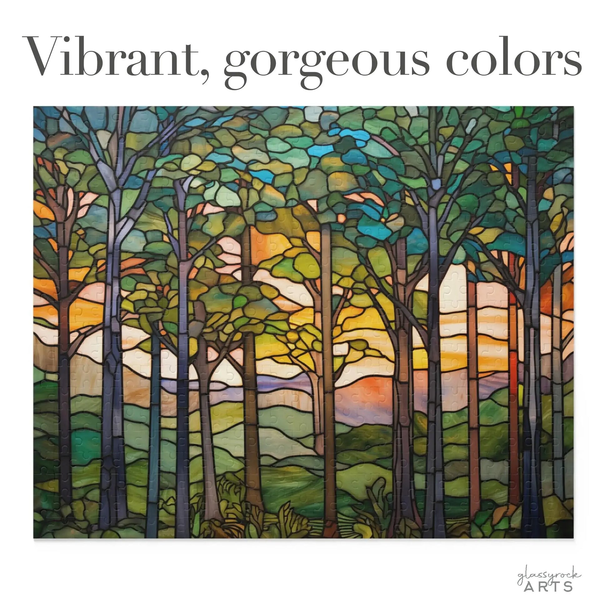 A vibrant stained glass artwork titled Sunset Forest Jigsaw Puzzle features tall trees against a colorful background of hills and a bright sky. Ideal for nature lovers, it includes the text Vibrant, gorgeous colors at the top and glasswork ARTS in the bottom right.