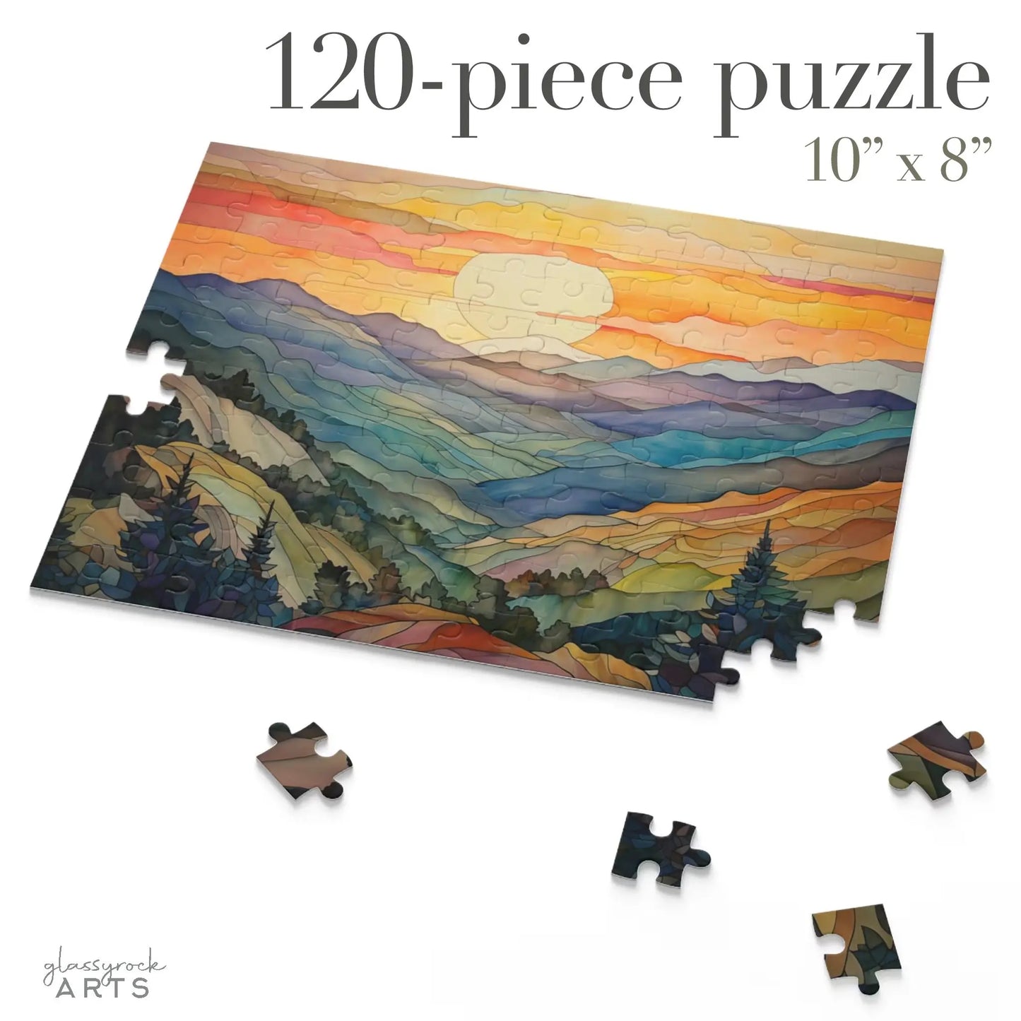 A partially completed Sunset Mountains Jigsaw Puzzle with 120 pieces, measuring 10 x 8, showcases a vibrant scenic landscape of peaks and a sunset sky. Perfect for nature lovers, three pieces remain scattered outside the main image.