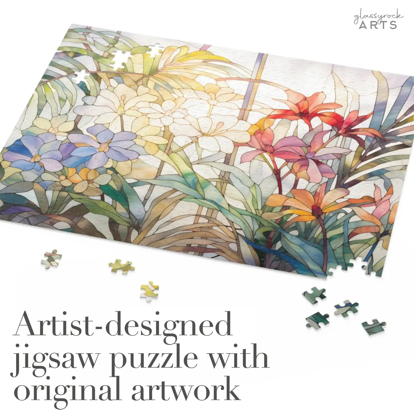 A partially completed Tropical Blooms Jigsaw Puzzle showcases vibrant flowers and lush leaves, with scattered pieces around. The text states, Artist-designed jigsaw featuring original artwork—ideal as an art gift.