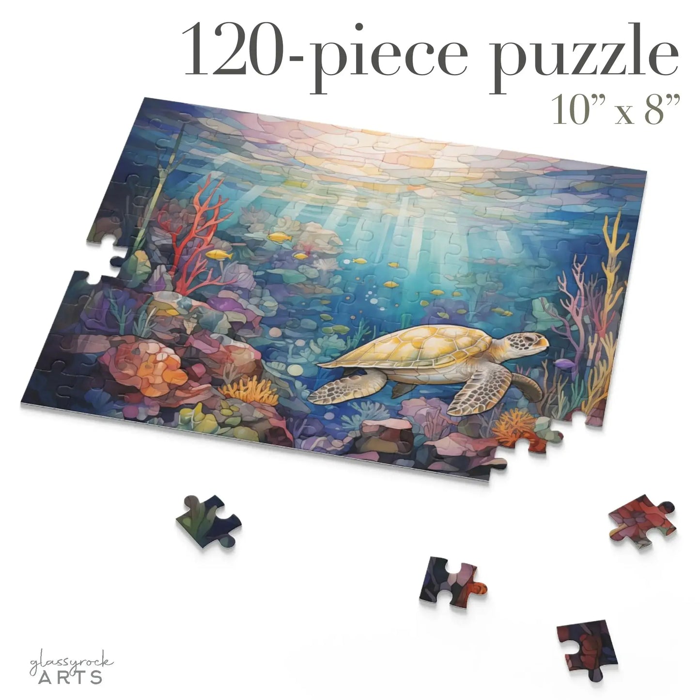 The 120-piece Sea Turtle Reef Jigsaw Puzzle, measuring 10 x 8, beautifully illustrates an underwater scene with a sea turtle reef and colorful coral. Four pieces are scattered around the vibrant tableau, enhancing the stained-glass effect of light filtering through the water.
