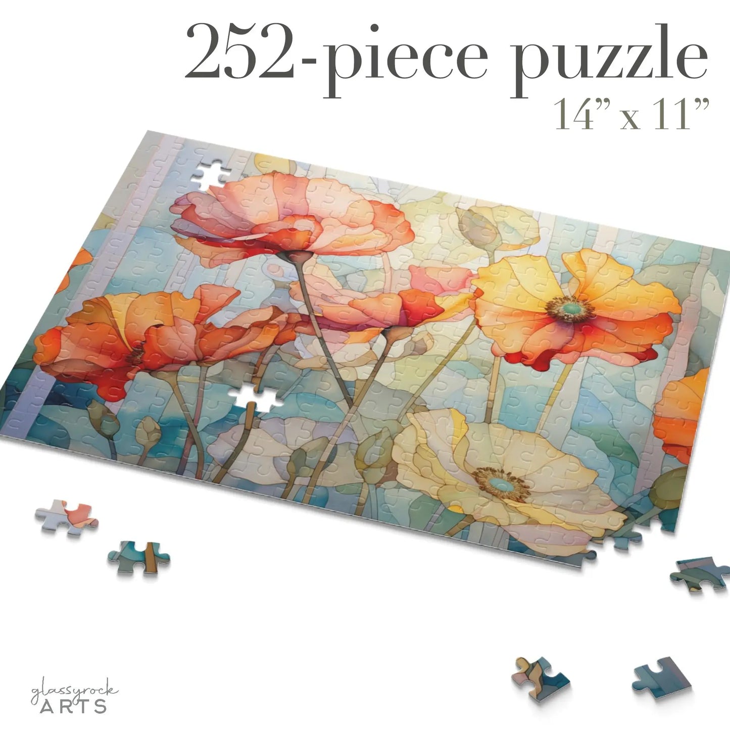 A partially completed Watercolor Poppies Jigsaw Puzzle features vibrant flowers on a soft background, surrounded by scattered pieces. The text reads 252-piece puzzle 14 x 11 and glassrock ARTS—an ideal art gift for enthusiasts.