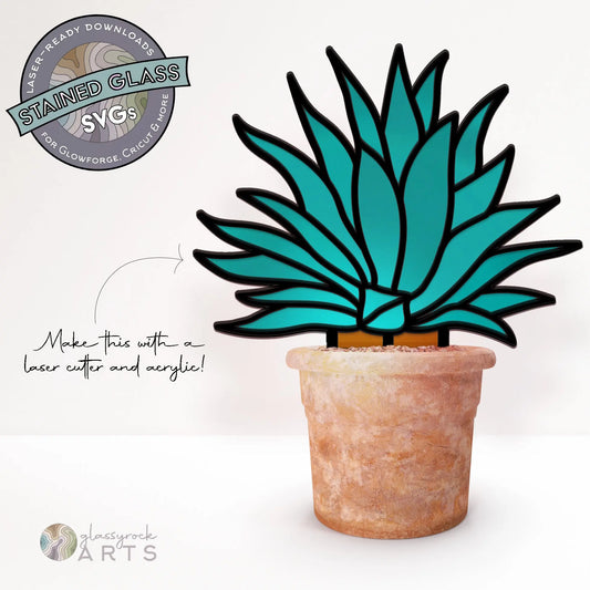 The Stained Glass Agave Plant SVG features a design of a cactus with blue-green leaves in a terracotta pot. It makes an ideal DIY gift for plant lovers and includes text for laser-ready crafts. The logo at the bottom reads Classy Rock Arts.